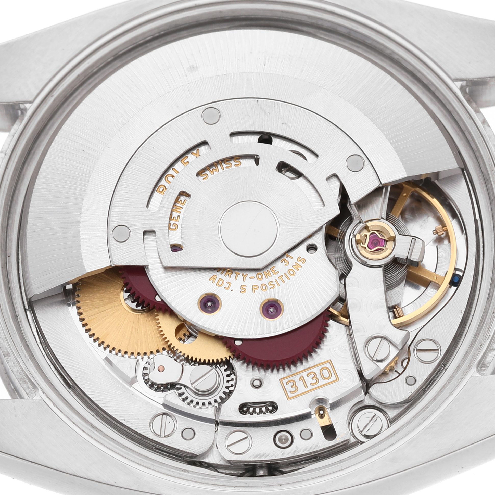 The image shows the movement of a Rolex Air-King 114210 Men's Stainless Steel Silver Dial watch from a rear view, highlighting gears and intricate components.