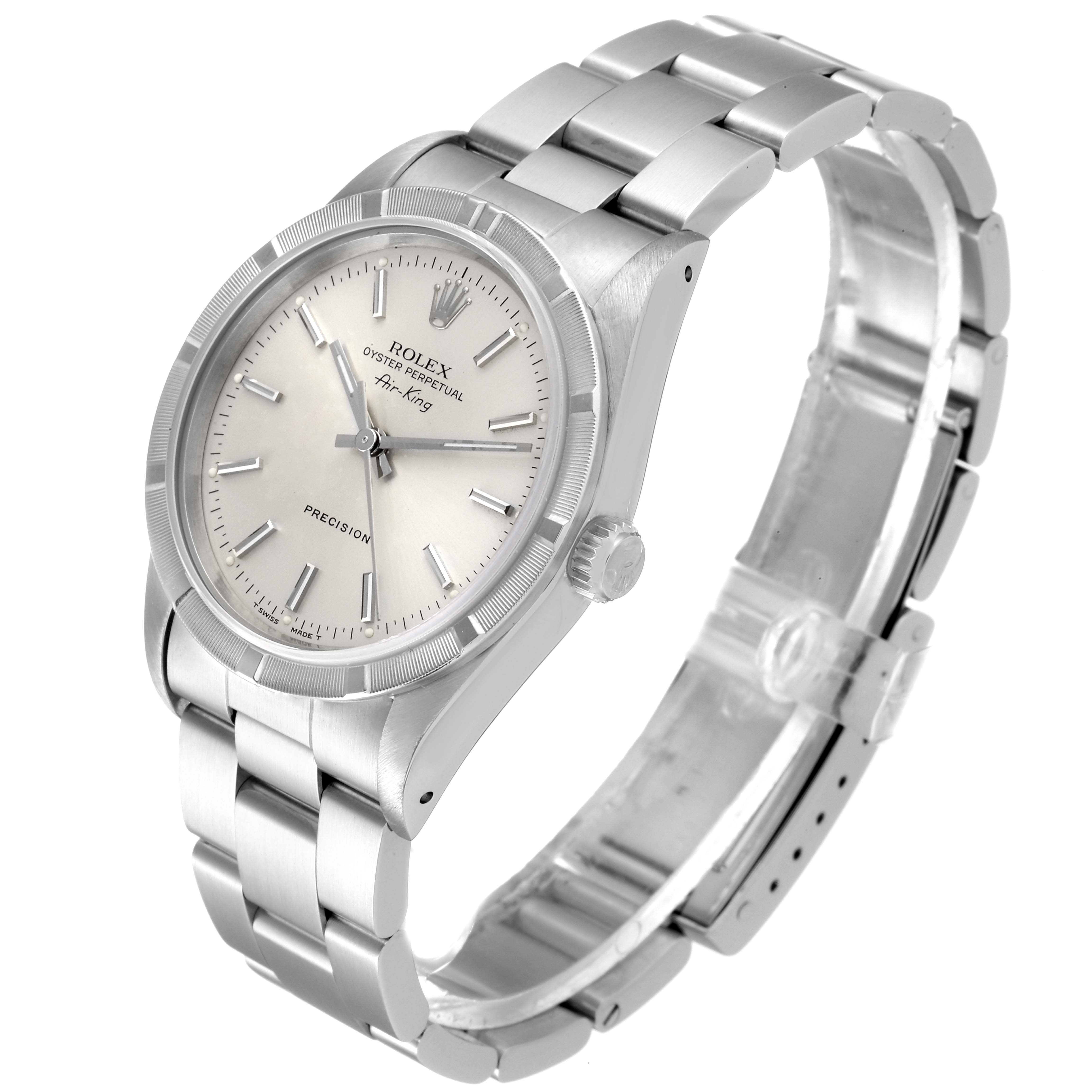 This image shows a Rolex Air-King 14010 Men's Stainless Steel Silver Dial 14010 Men's Stainless Steel Silver Dial watch from an angled side view, displaying the face, bezel, and bracelet.