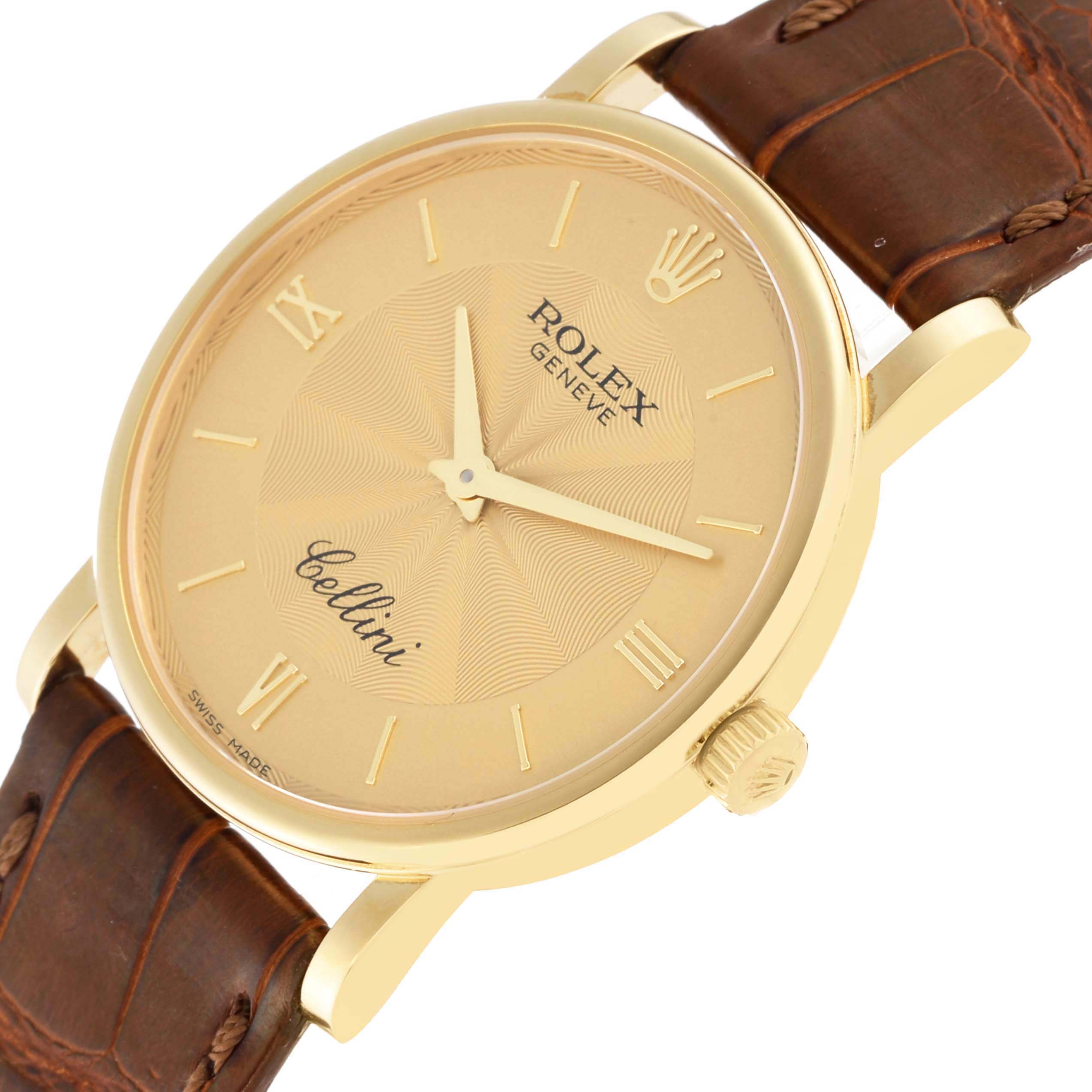 The image shows a Rolex Cellini 5115 Men's Yellow Gold Champagne Dial 5115 Men's Yellow Gold Champagne Dial watch from an angled view, highlighting its gold dial, brown leather strap, and crown.