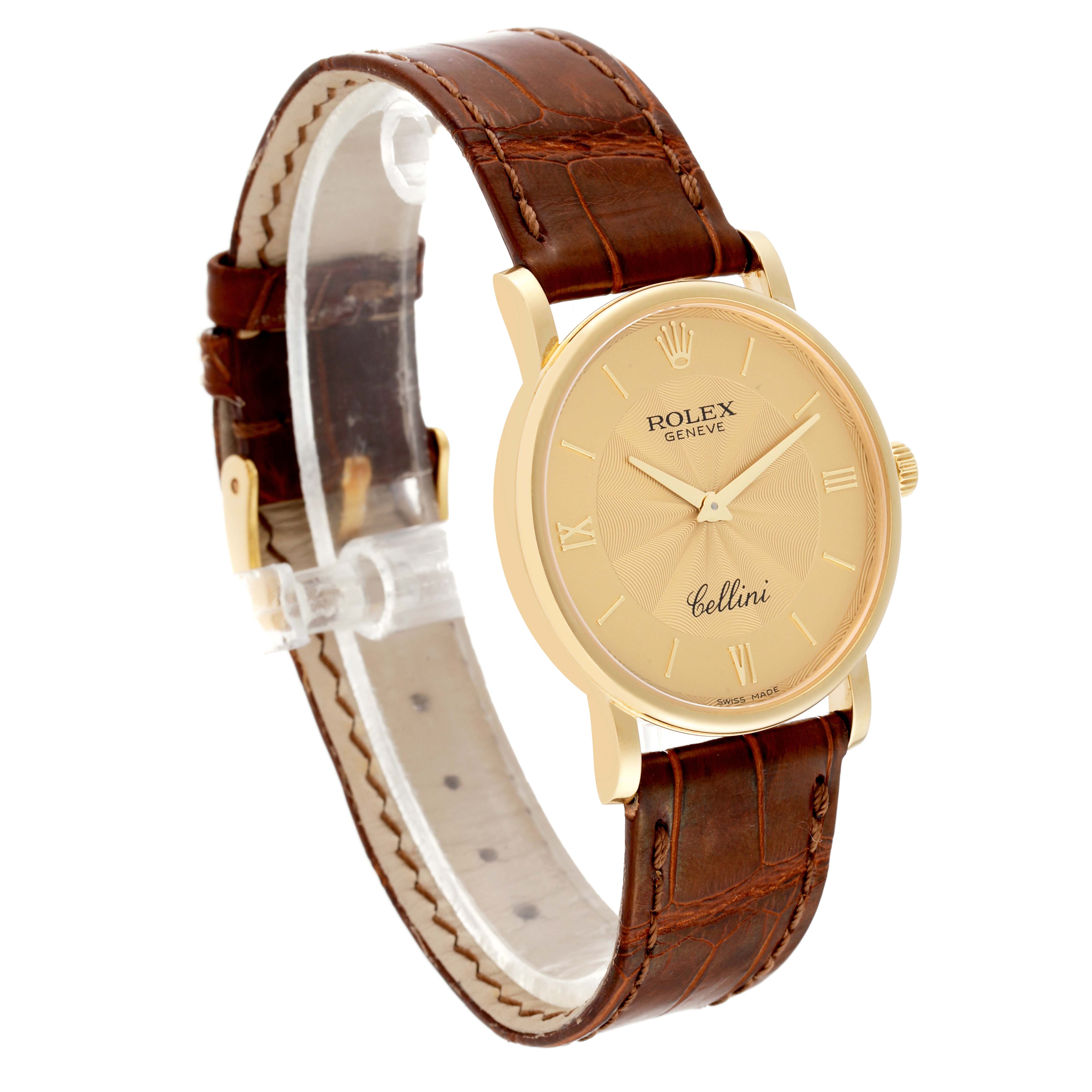 This is a side view of the Cellini by Rolex, showing the watch face, brown leather strap, and gold-tone case.