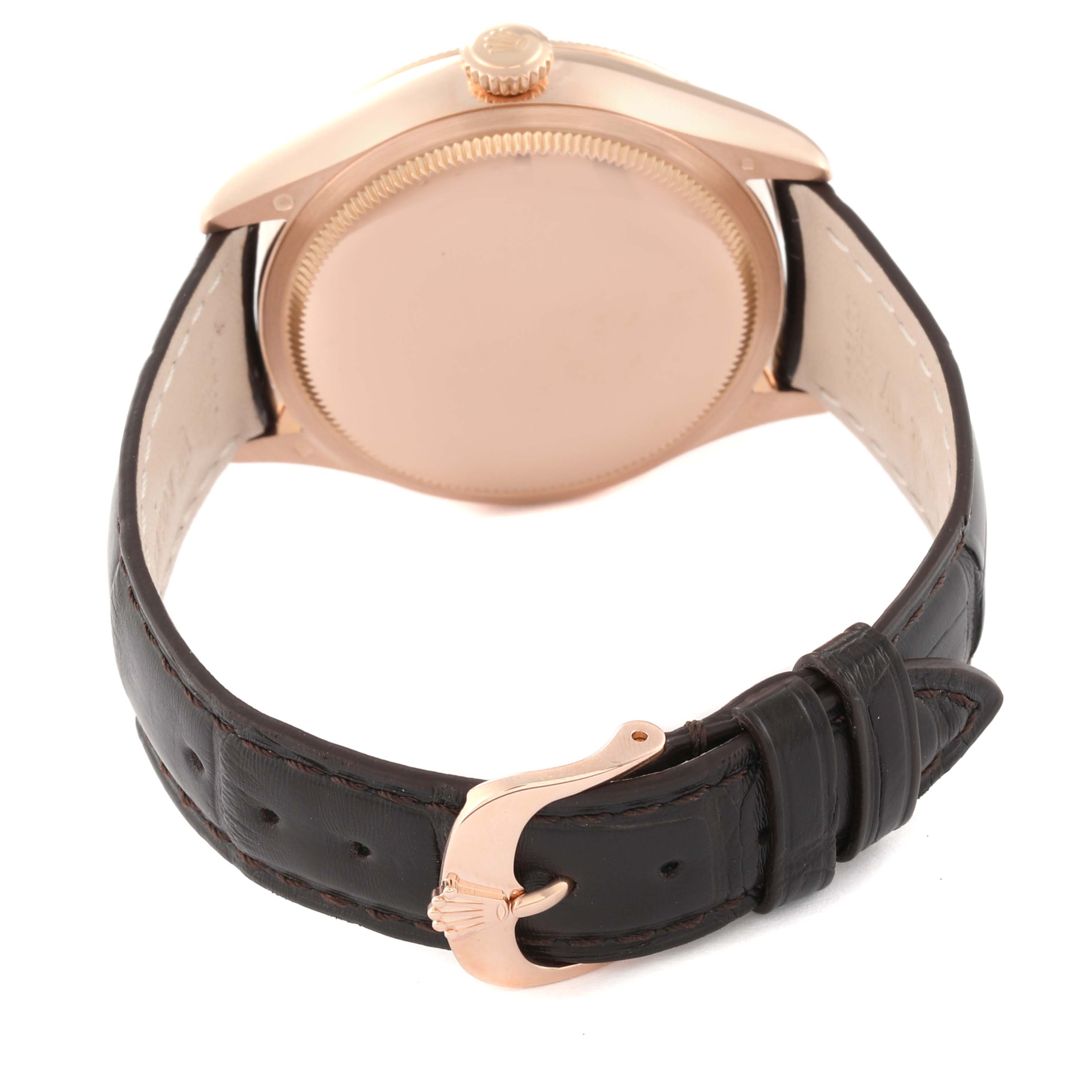 The image shows the back view of a Rolex Cellini 50515 Men's Rose Gold Silver Dial 50515 Men's Rose Gold Silver Dial watch, highlighting the case back, crown, and leather strap with a gold clasp.