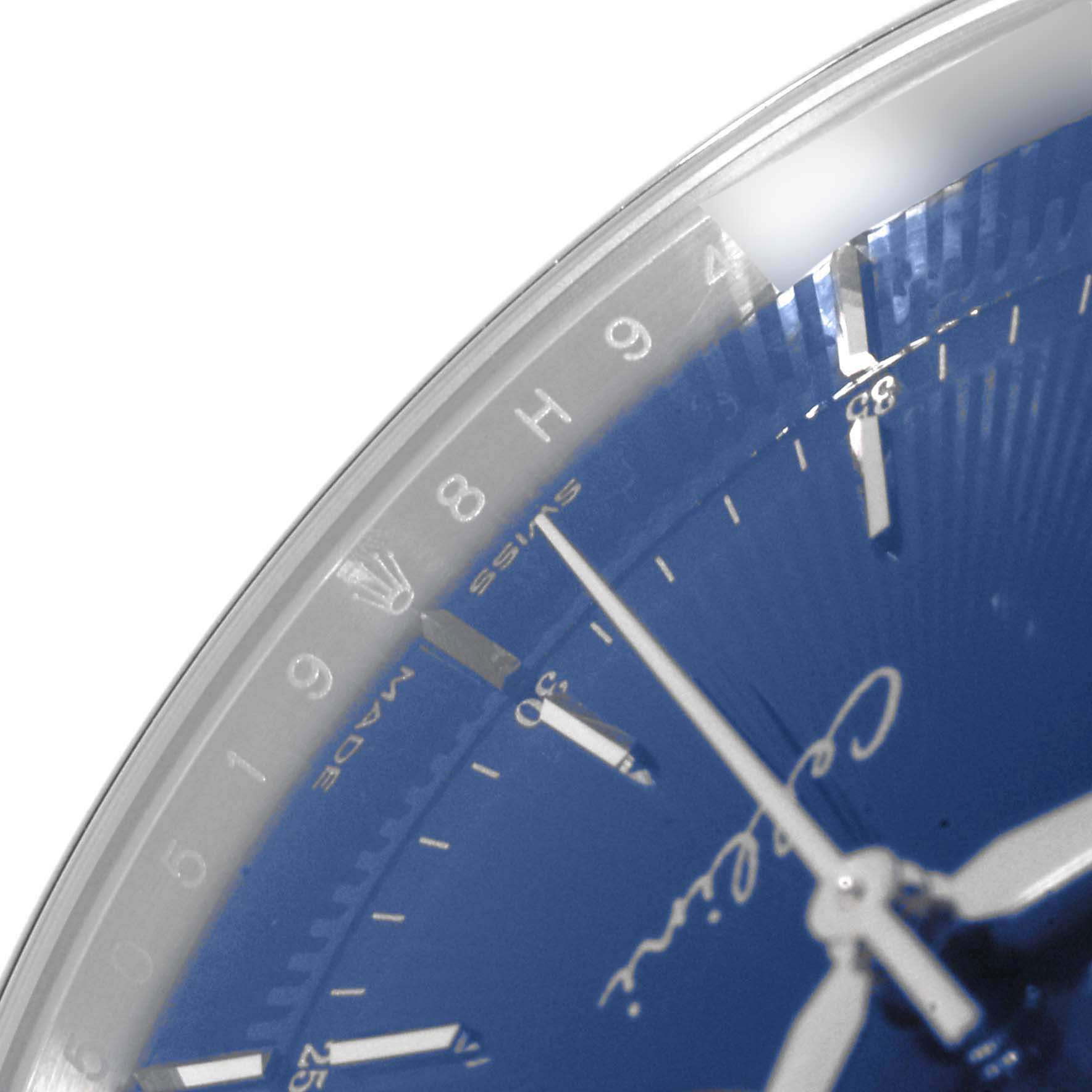 The image shows a close-up of the Rolex Cellini 50519 Men's White Gold Blue Dial 50519 Men's White Gold Blue Dial watch's blue dial, hour markers, and hands, viewed from an angled perspective.