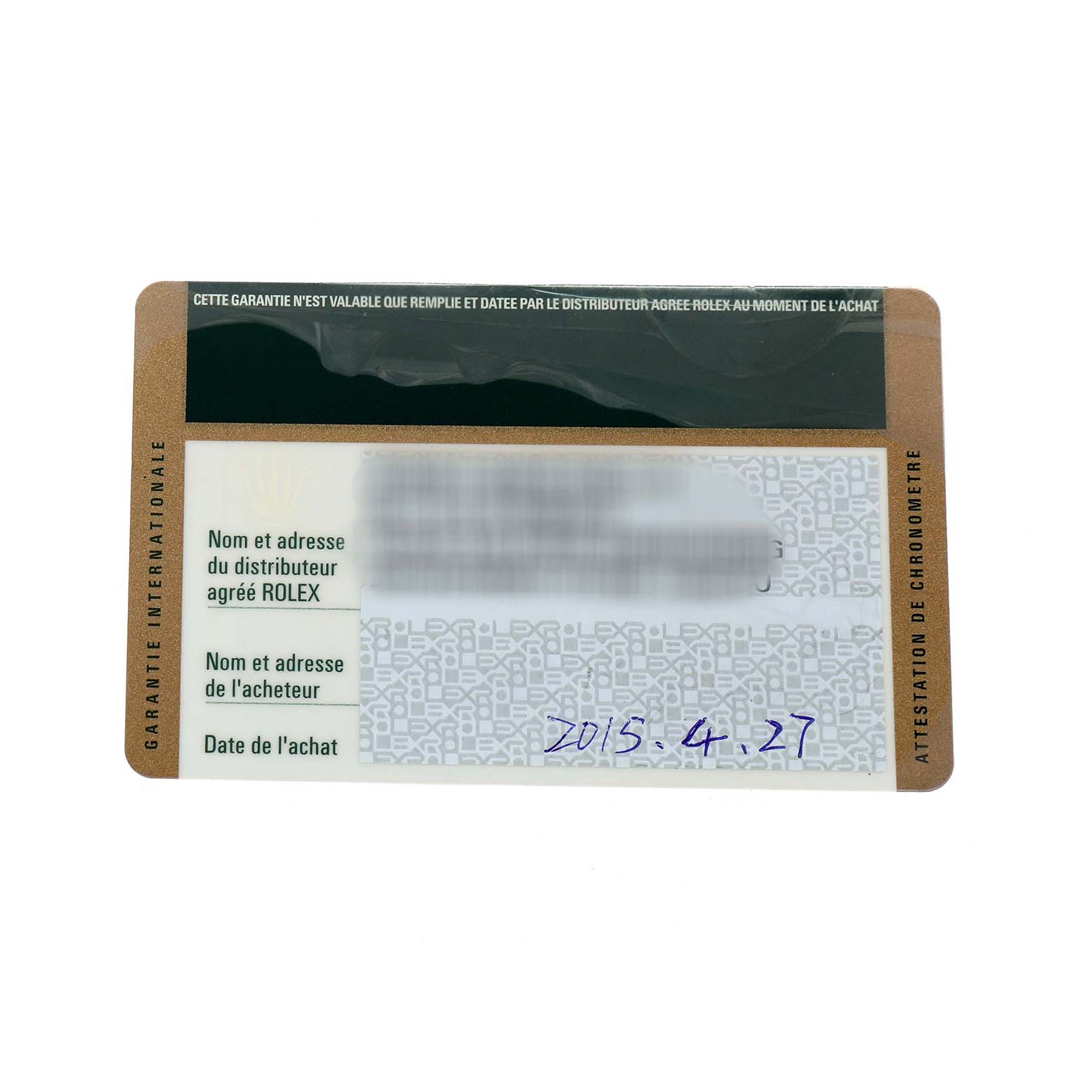 The image shows a Rolex Date 115200 Men's Stainless Steel White Dial model warranty card viewed from above.