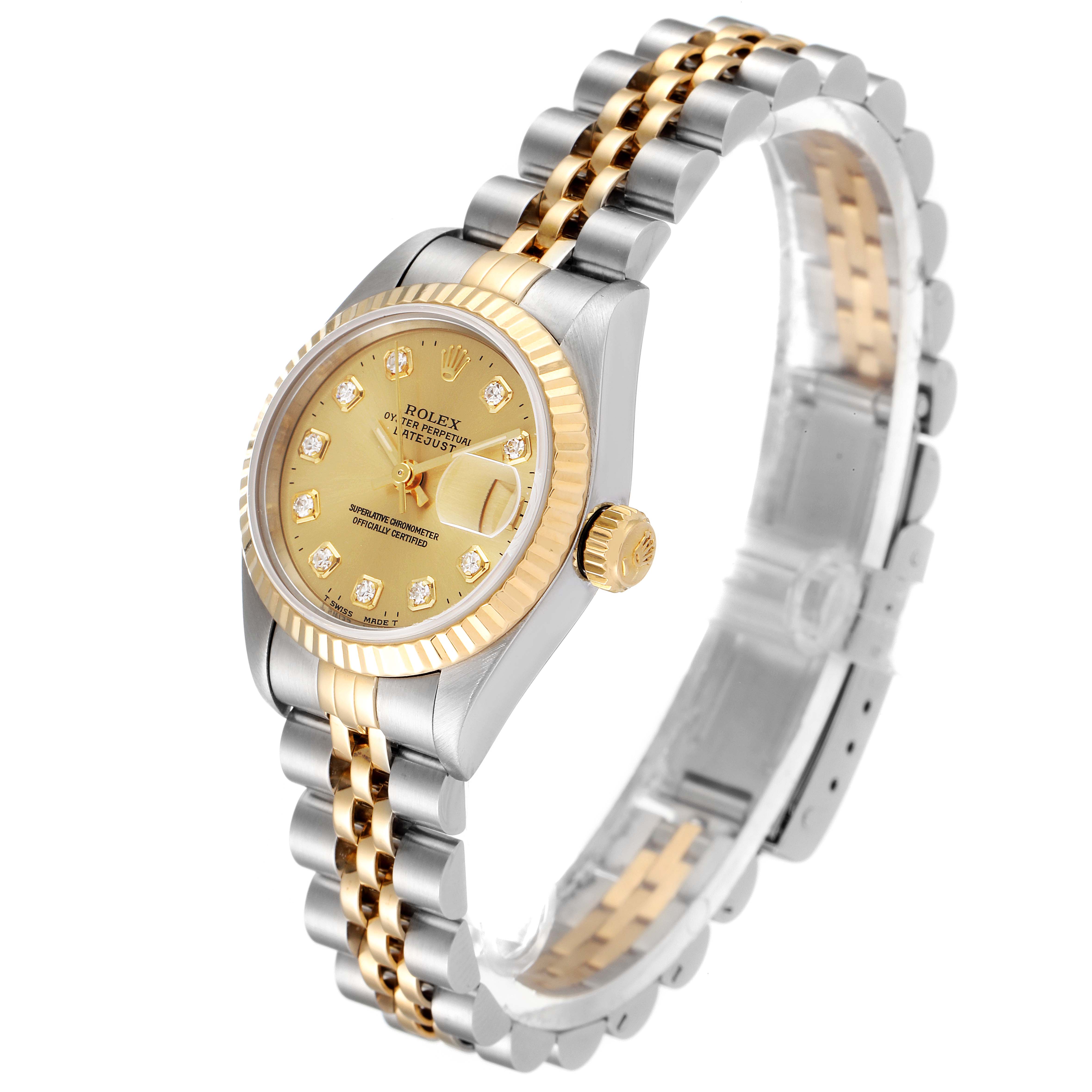 This Rolex Datejust 69173 Women
s Steel and Gold (two tone) Champagne Dial 69173 Women
s Steel and Gold (two tone) Champagne Dial watch is shown at a slight angle, highlighting its gold dial, fluted bezel, and jubilee two-tone bracelet.