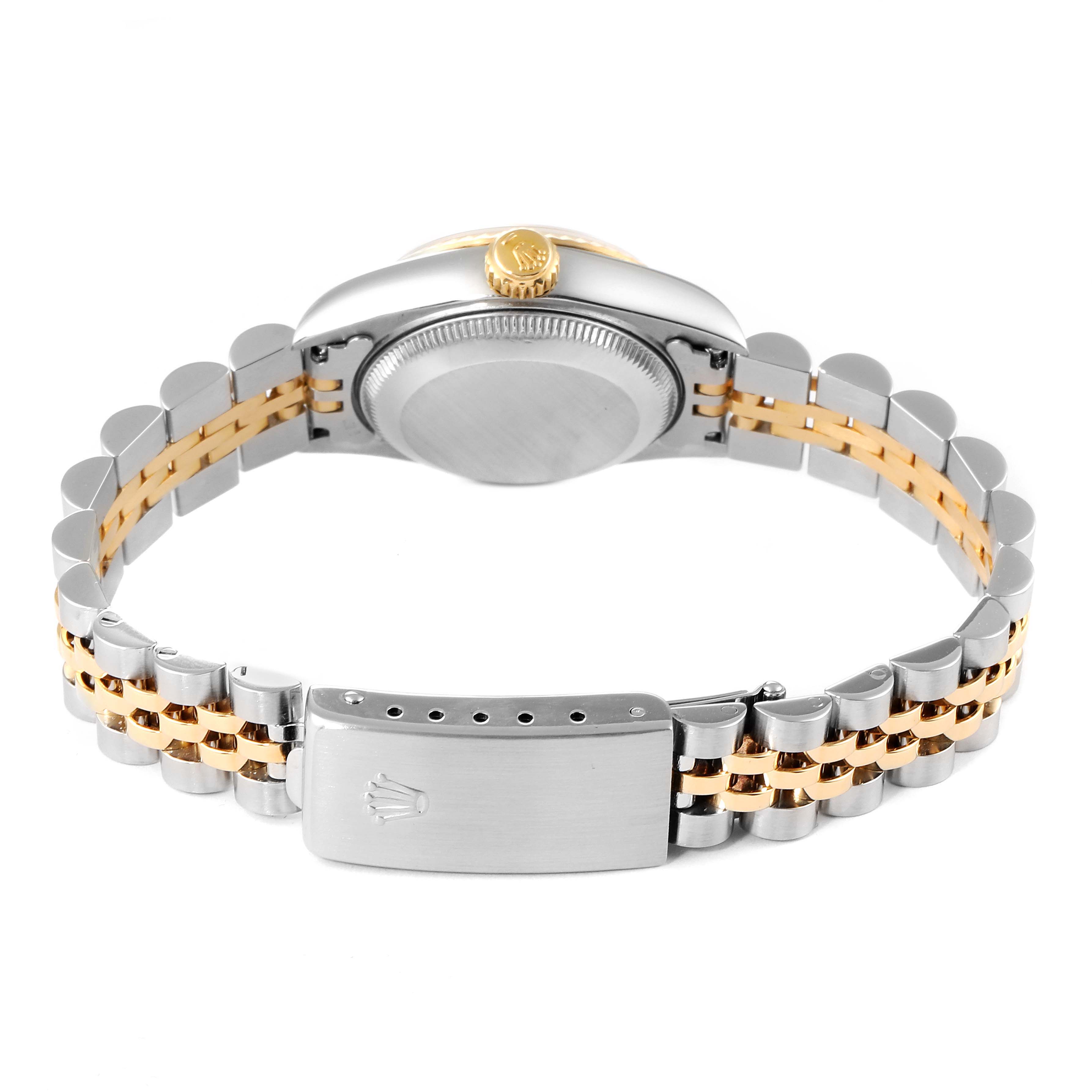 The image shows the back view of a Rolex Datejust 69173 Women
s Steel and Gold (two tone) Champagne Dial 69173 Women
s Steel and Gold (two tone) Champagne Dial watch, highlighting the two-tone jubilee bracelet and clasp.
