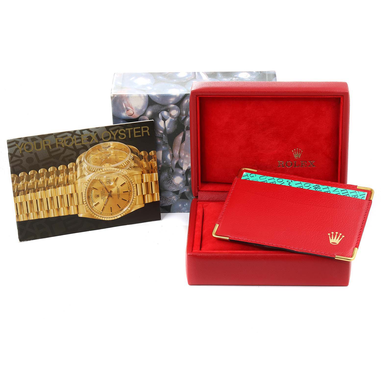 The image shows a Rolex Datejust 69173 Women
s Steel and Gold (two tone) Champagne Dial 69173 Women
s Steel and Gold (two tone) Champagne Dial model box, booklet, and red cardholder with the Rolex logo.