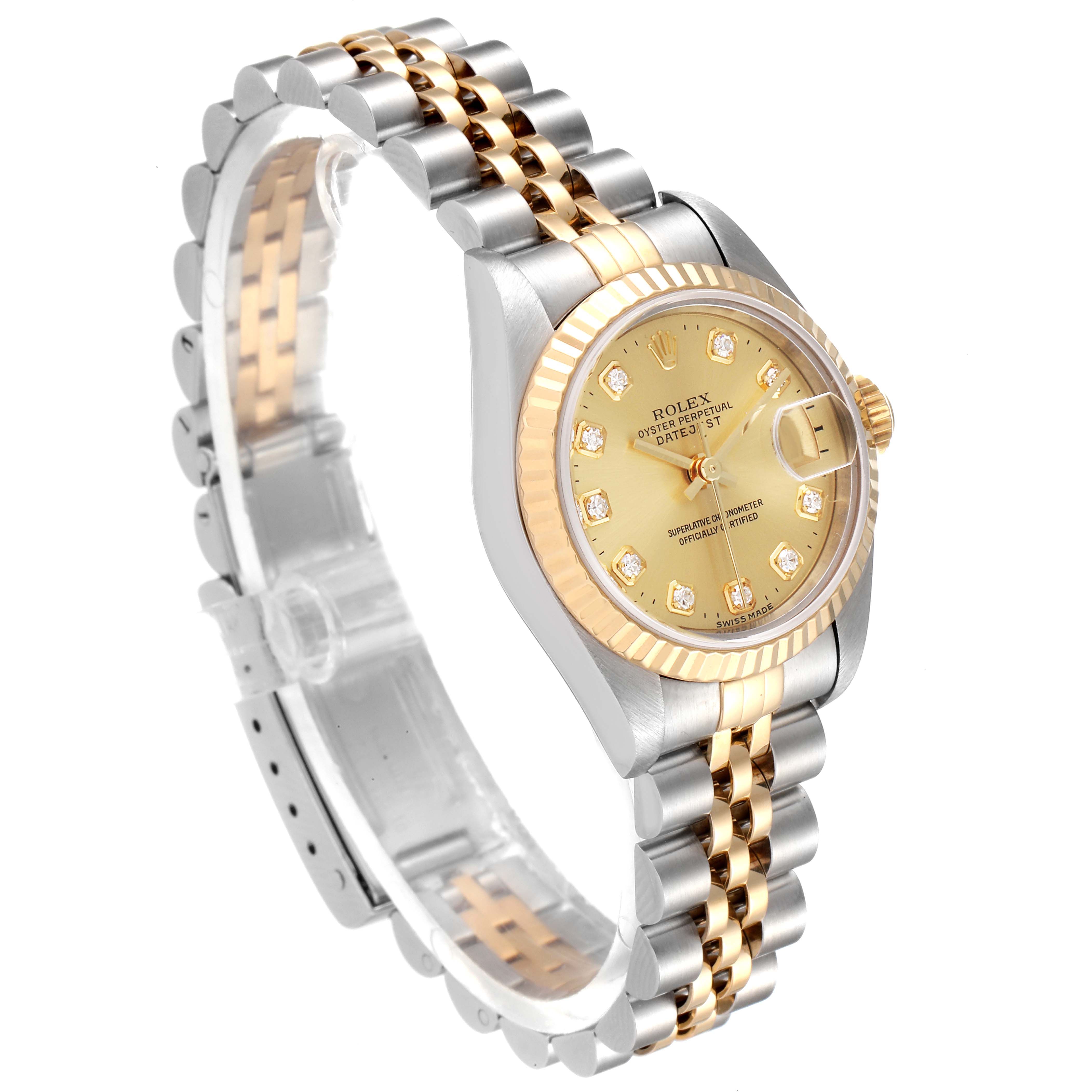 The image shows a Rolex Datejust 69173 Women
s Steel and Gold (two tone) Champagne Dial 69173 Women
s Steel and Gold (two tone) Champagne Dial watch at an oblique angle, highlighting its gold dial, diamond hour markers, and two-tone Jubilee bracelet.