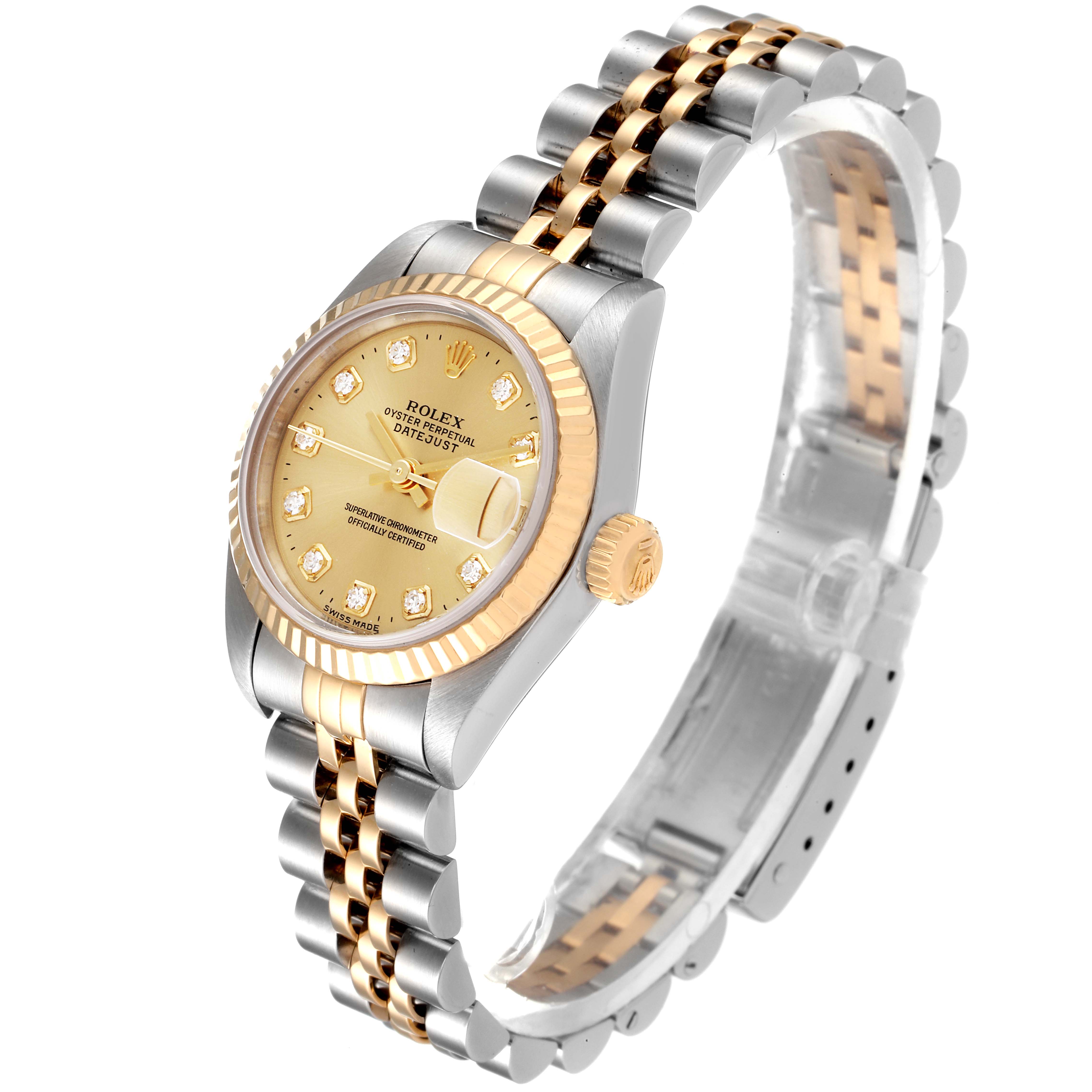 This image shows a Rolex Datejust 69173 Women
s Steel and Gold (two tone) Champagne Dial 69173 Women
s Steel and Gold (two tone) Champagne Dial watch at a slight angle, highlighting its gold dial, two-tone bracelet, and fluted bezel.