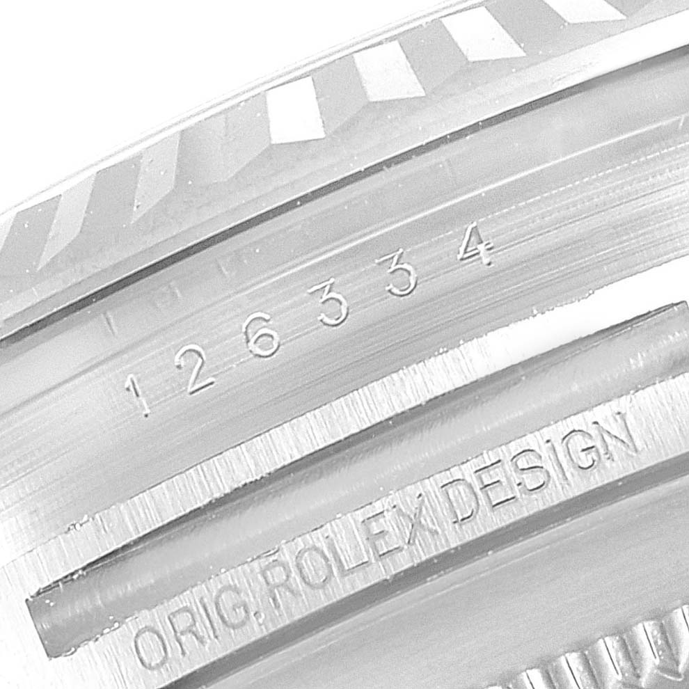 A close-up of the Rolex Datejust 41 126334 Men's Stainless Steel Mother of Pearl Dial 126334 Men's Stainless Steel Mother of Pearl Dial watch showing the engraved model number "126334" and "ORIG. ROLEX DESIGN."