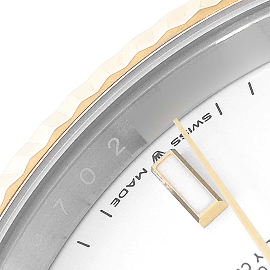 The image shows a close-up of the bezel, part of the dial, and markers of a Rolex Datejust 41 126333 Men's Steel and Gold (two tone) White Dial 126333 Men's Steel and Gold (two tone) White Dial model.