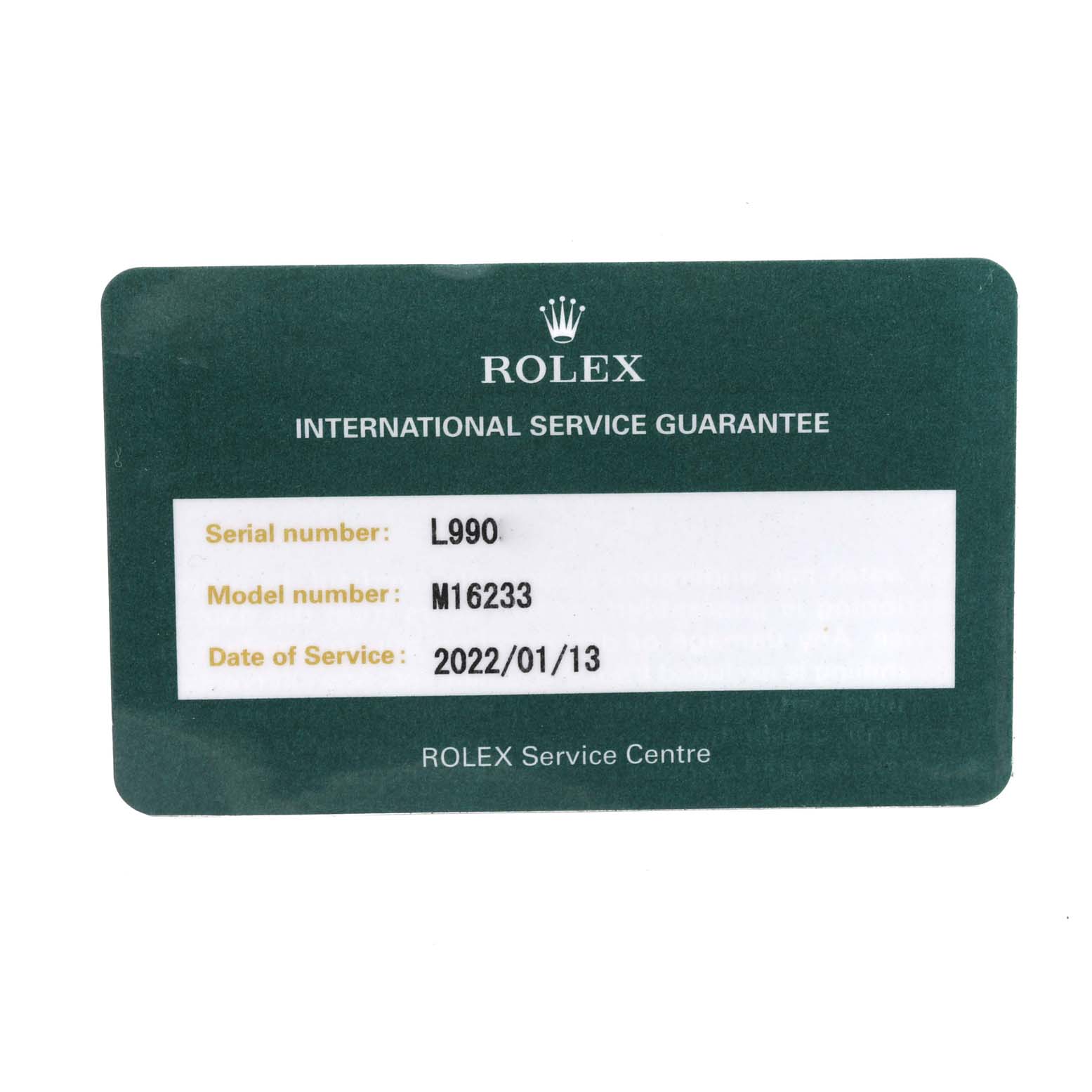 The image shows a Rolex International Service Guarantee card for a Datejust model with information about serial, model number, and service date.