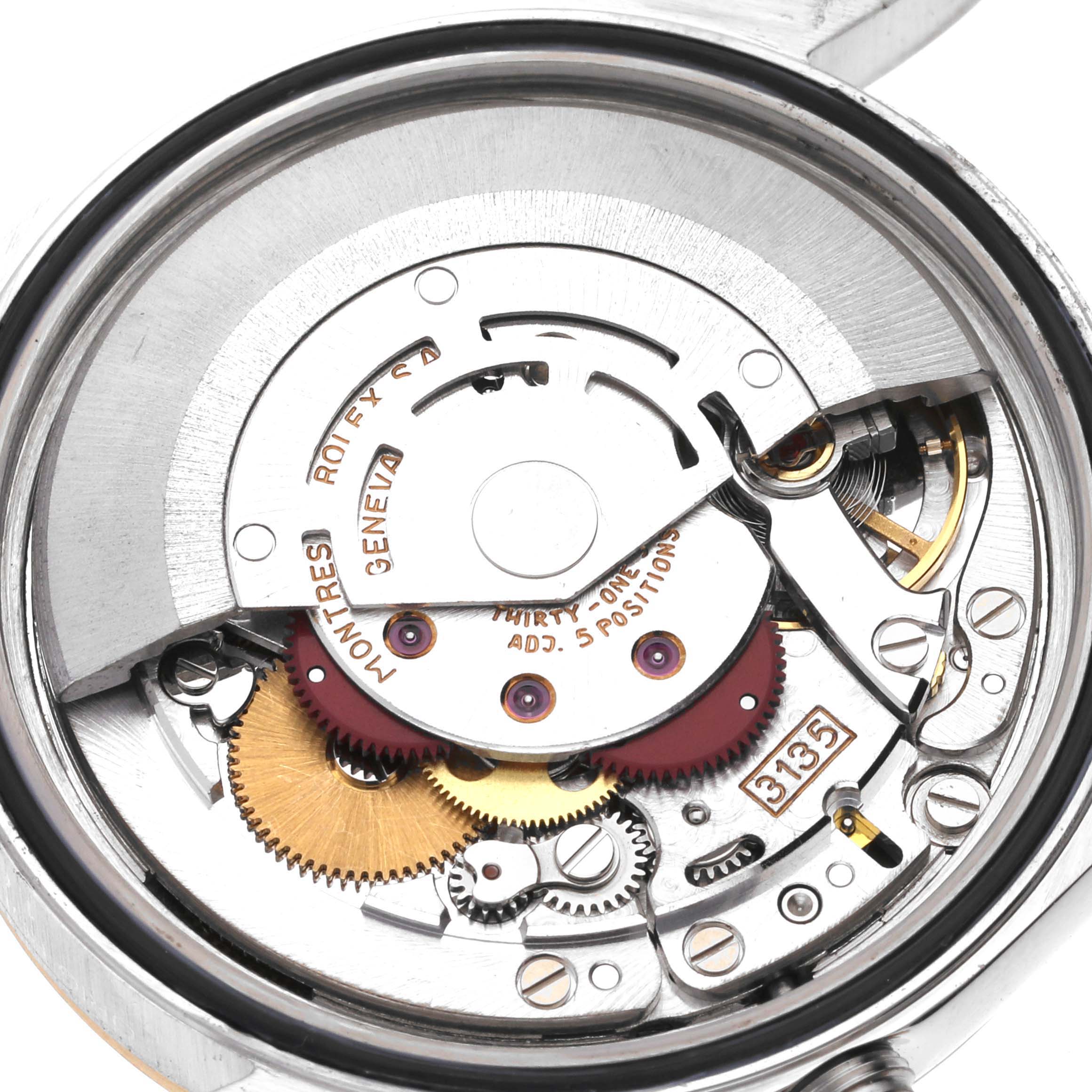 This image shows the internal mechanical movement of a Rolex Datejust 16233 Men's Steel and Gold (two tone) Champagne Dial 16233 Men's Steel and Gold (two tone) Champagne Dial watch from a close-up angle.