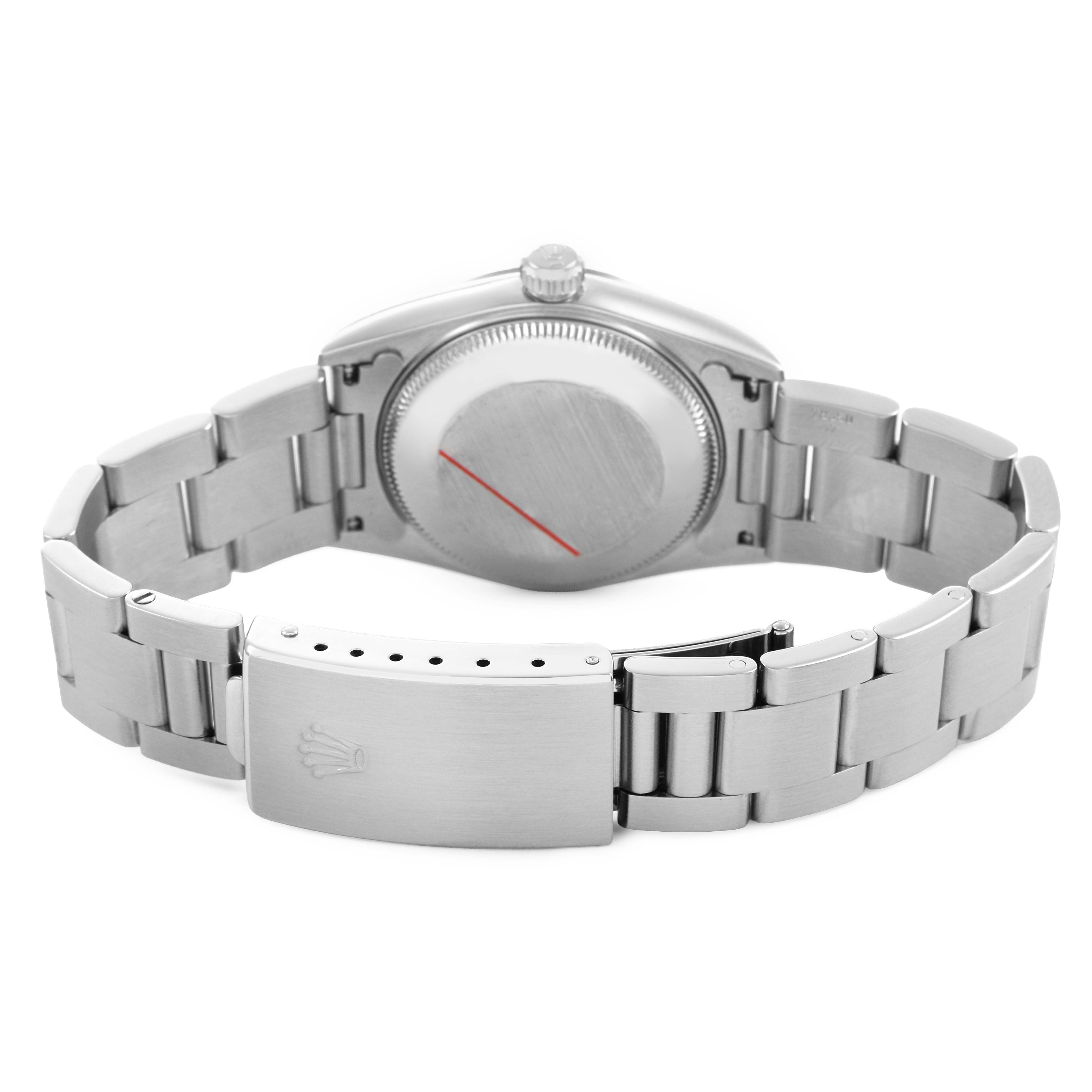 The image shows the back of a Rolex Datejust 78274 Men's Stainless Steel Black Dial watch, highlighting the clasp, bracelet, and case back.