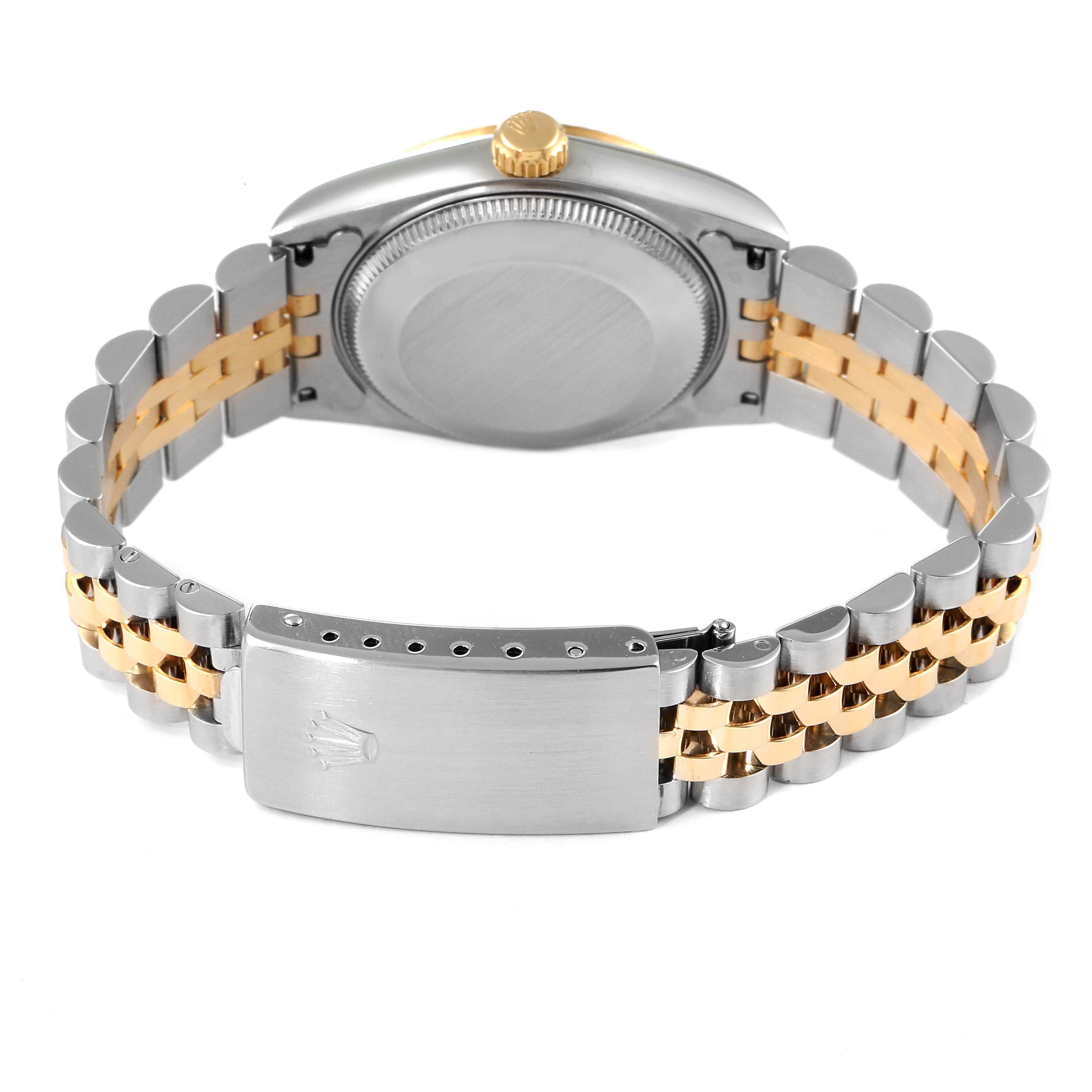 The image shows the back of a Rolex Mid-Size 68273 Women's Steel and Gold (two tone) Champagne Dial 68273 Women's Steel and Gold (two tone) Champagne Dial watch, displaying the closed case back, crown, and two-tone bracelet with the clasp.