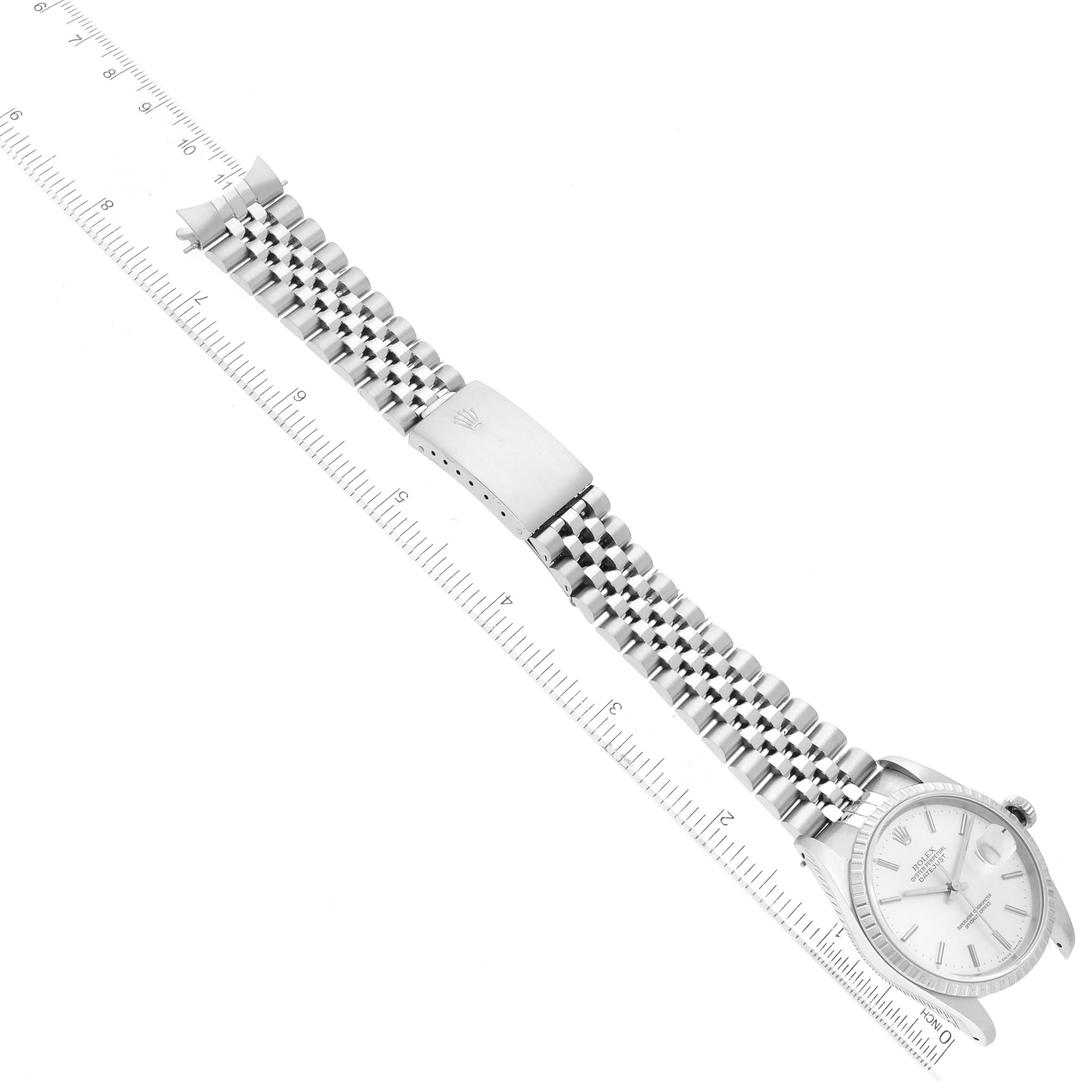 The Rolex Datejust 16220 Men's Stainless Steel Silver Dial 16220 Men's Stainless Steel Silver Dial watch is shown at a diagonal angle, highlighting its bracelet, clasp, and a portion of the watch face.