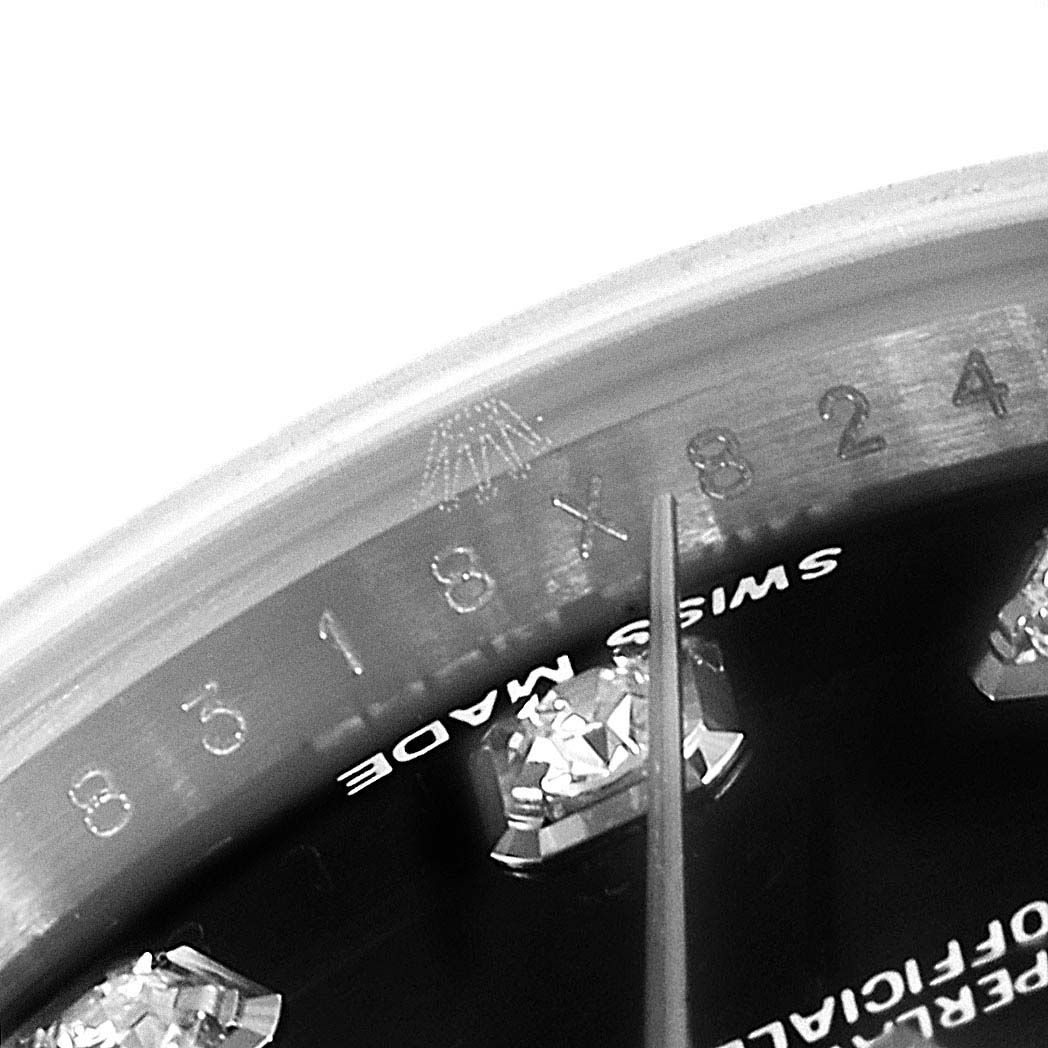 The close-up image shows the bezel and dial of a Rolex Datejust 179174  Women
s Stainless Steel Black Dial 179174  Women
s Stainless Steel Black Dial watch, highlighting the "Swiss Made" text and diamond markers.