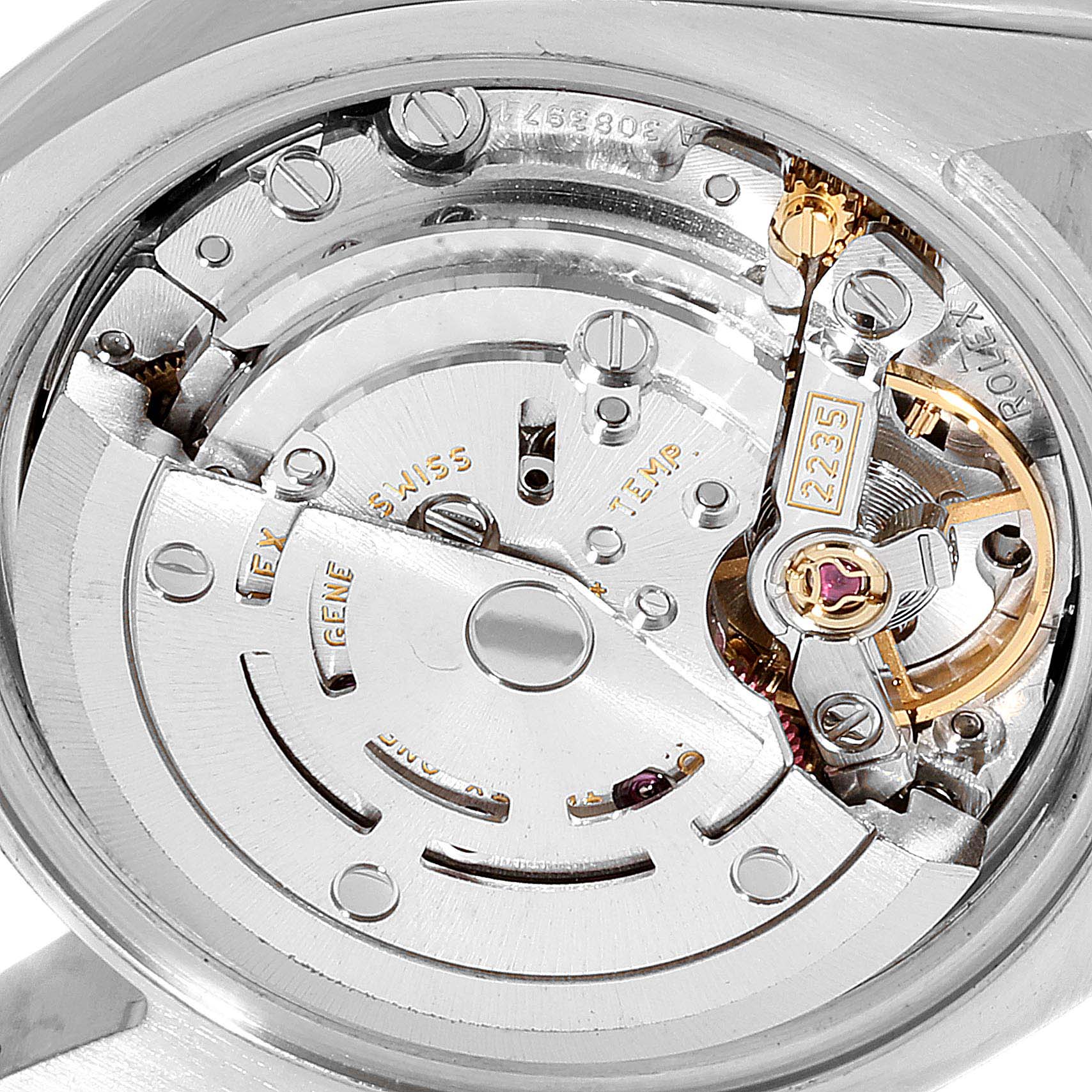 The image shows a close-up of the internal movement mechanism of a Rolex Datejust 179174  Women
s Stainless Steel Black Dial 179174  Women
s Stainless Steel Black Dial watch.