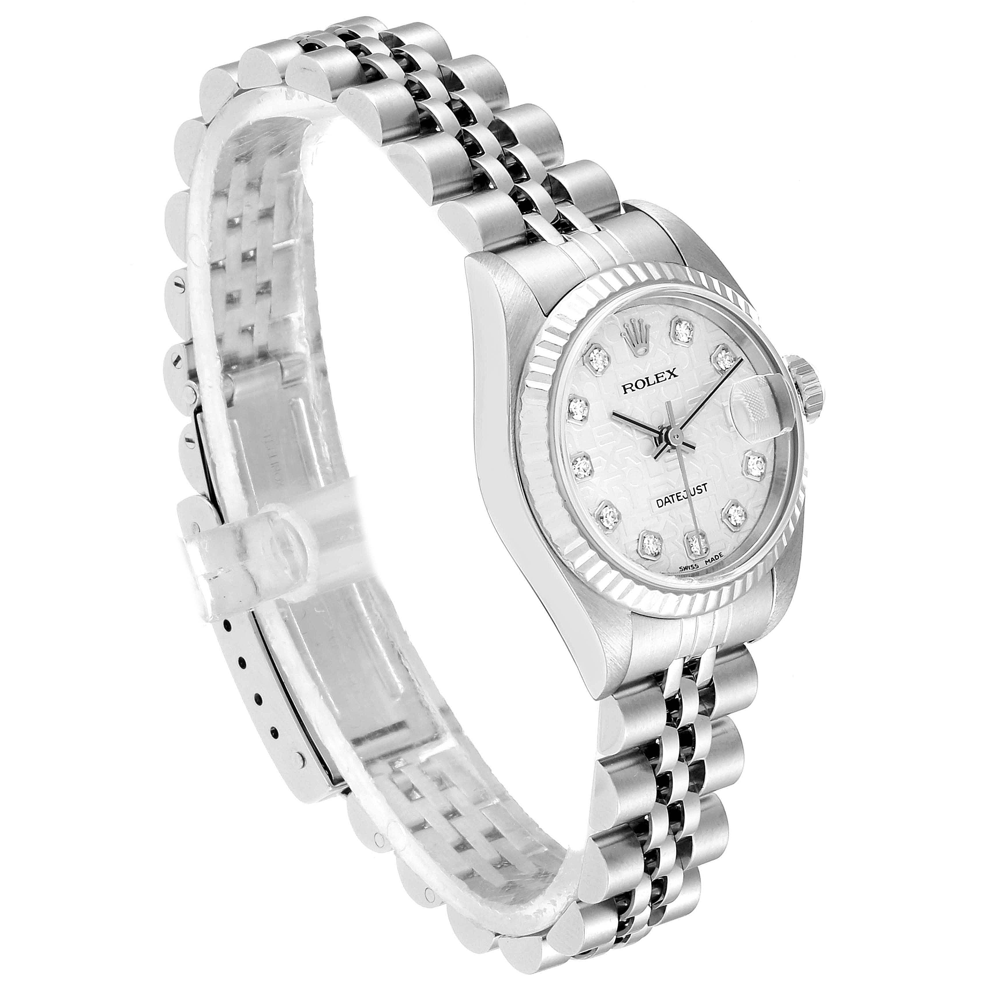 This image shows a side angle of a Rolex Datejust 79174  Women
s Stainless Steel Silver Dial 79174  Women
s Stainless Steel Silver Dial watch, including the case, dial, fluted bezel, and jubilee bracelet.