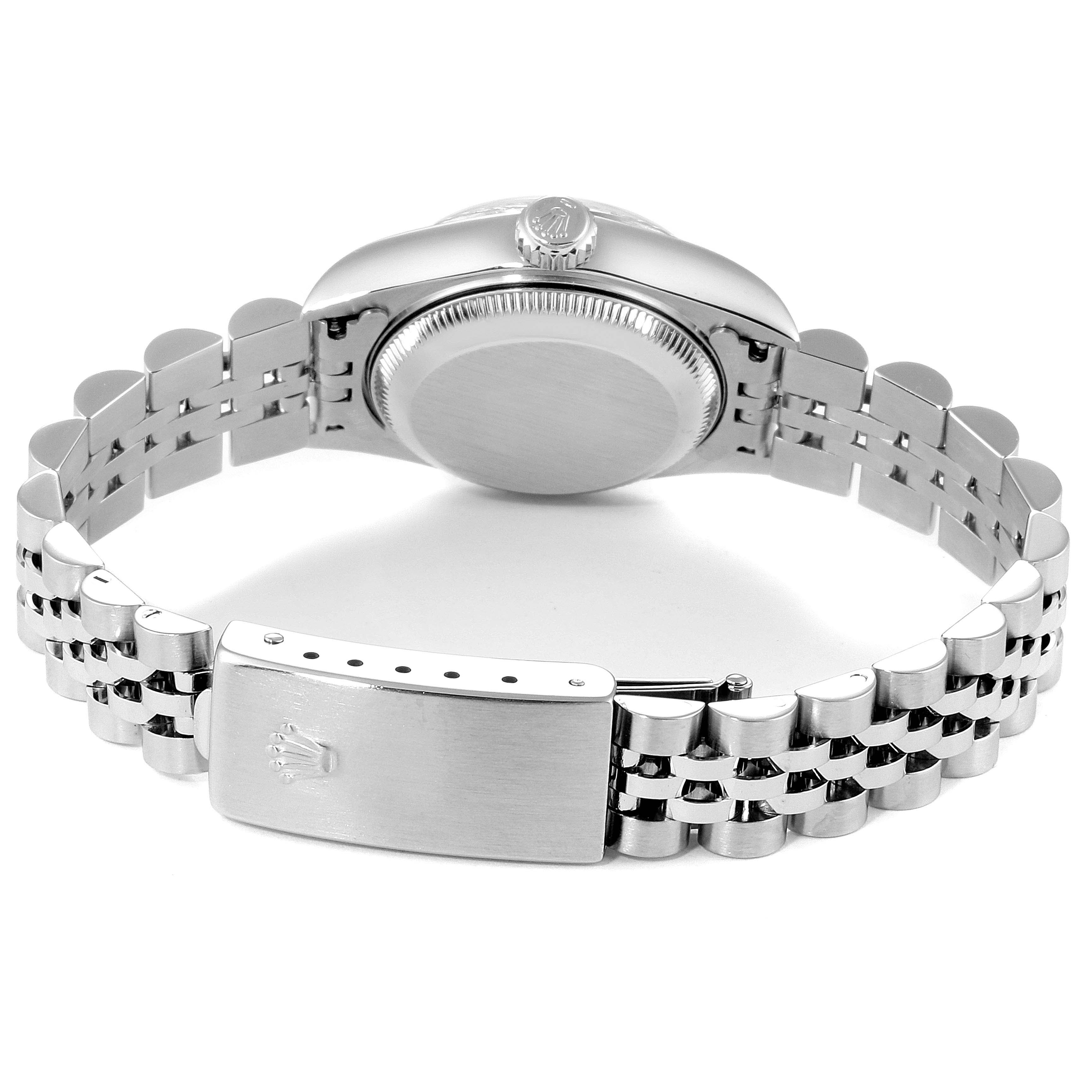 This image shows the back view of the Rolex Datejust 79174  Women
s Stainless Steel Silver Dial 79174  Women
s Stainless Steel Silver Dial watch, highlighting its case back, crown, and jubilee bracelet with the clasp.