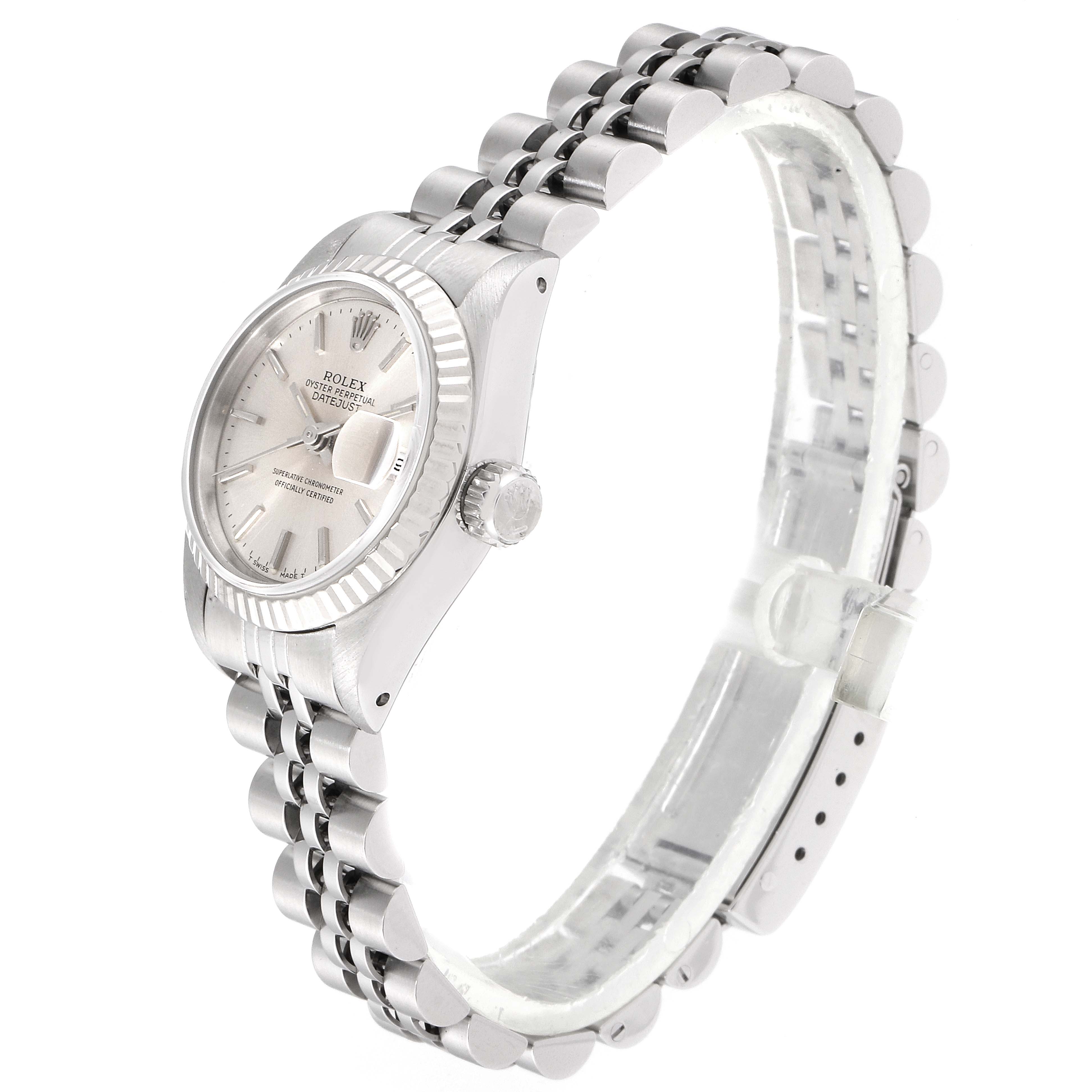 The image shows a side view of a Rolex Datejust 69174 Women
s Stainless Steel Silver Dial 69174 Women
s Stainless Steel Silver Dial watch, highlighting the dial, crown, and bracelet.