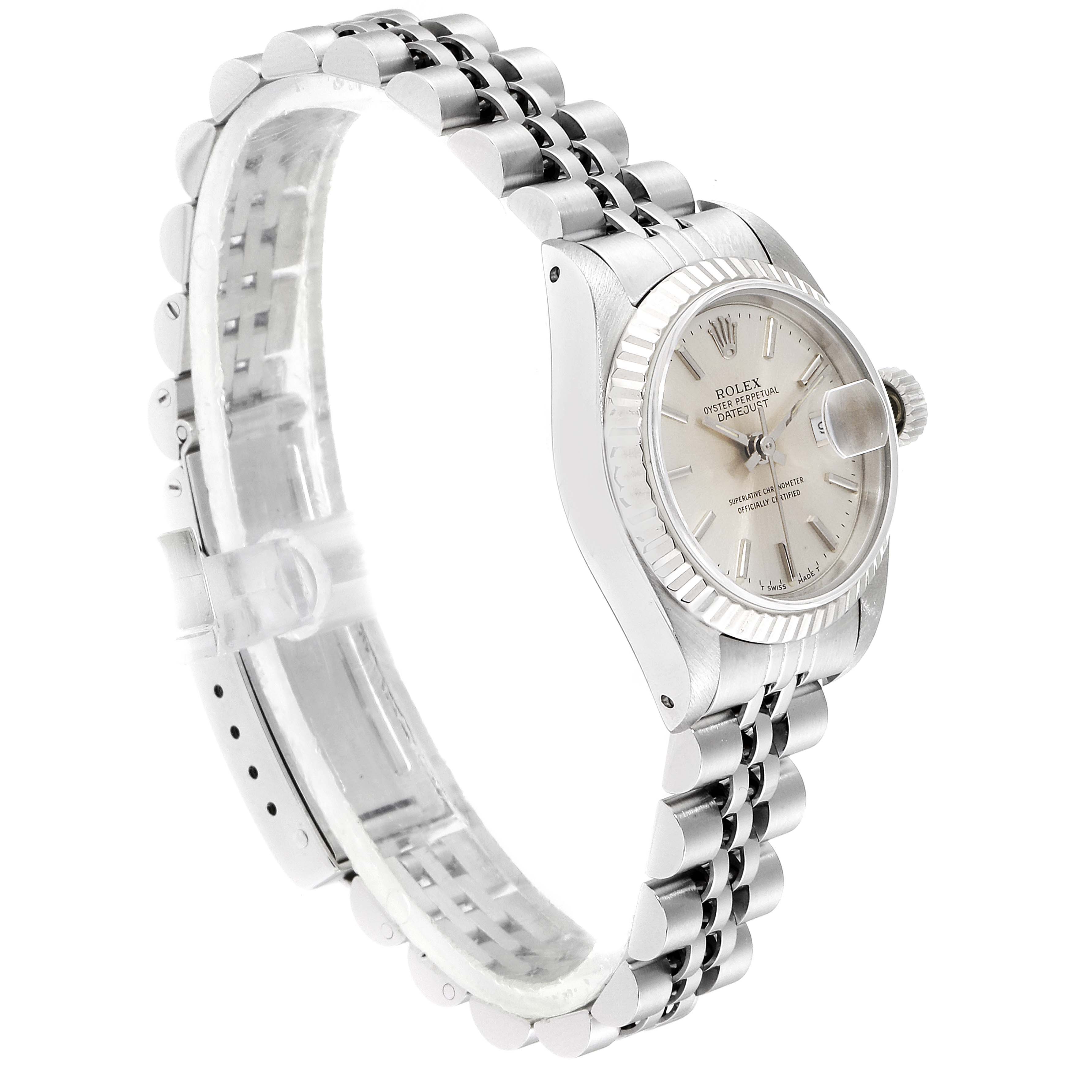 The image shows a side angle of a Rolex Datejust 69174 Women
s Stainless Steel Silver Dial 69174 Women
s Stainless Steel Silver Dial watch highlighting its silver dial, fluted bezel, and Jubilee bracelet.
