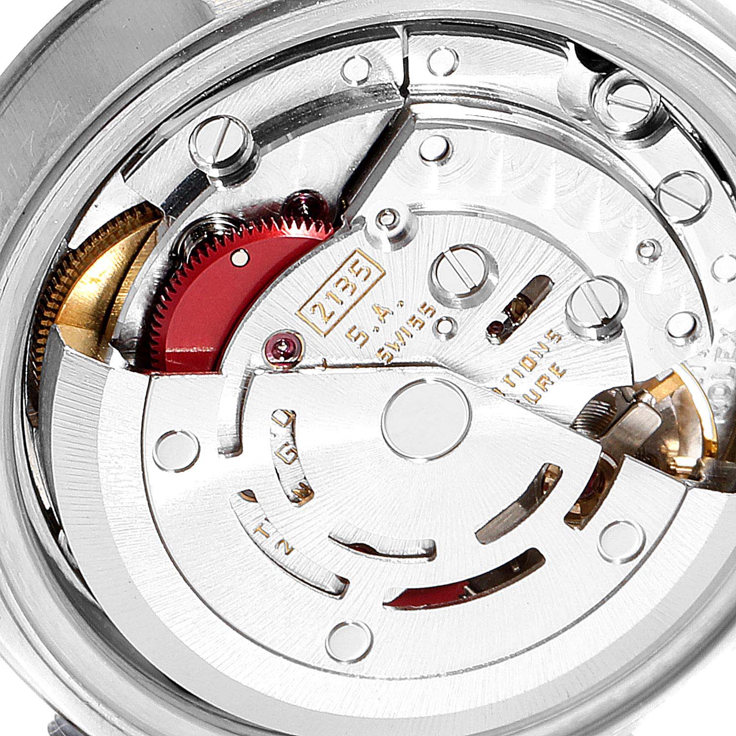 The image shows a close-up view of the Rolex Datejust 69174 Women
s Stainless Steel Silver Dial 69174 Women
s Stainless Steel Silver Dial movement mechanism, revealing intricate internal components and gears.