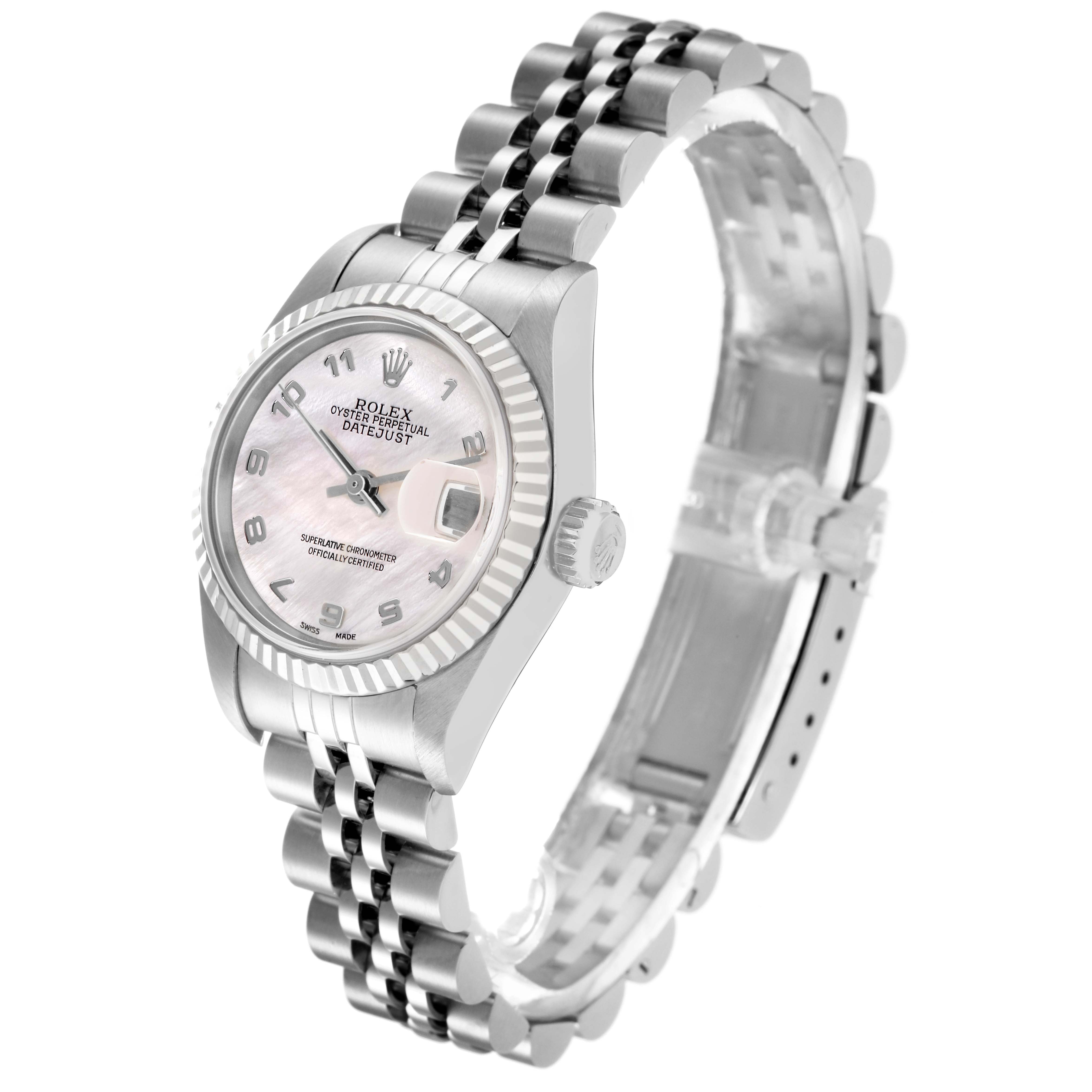 The Rolex Datejust 79174 Women
s Stainless Steel Mother of Pearl Dial 79174 Women
s Stainless Steel Mother of Pearl Dial watch is shown at a three-quarter angle, displaying the dial, bezel, crown, and Jubilee bracelet.