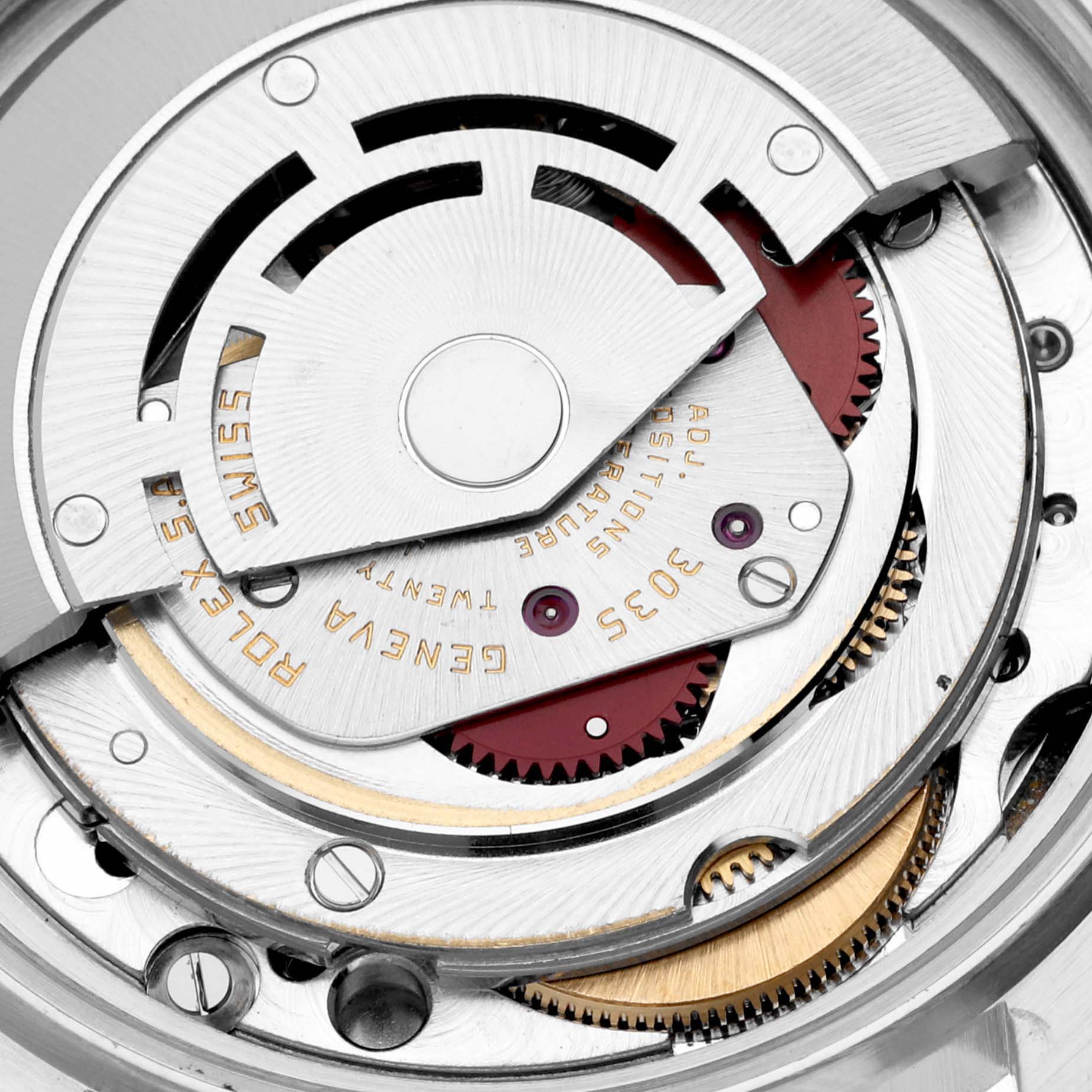 This image shows the intricate internal mechanism of the Rolex Datejust 16014 Men's Stainless Steel Silver Dial 16014 Men's Stainless Steel Silver Dial, featuring its gears and movements from a close-up angle.