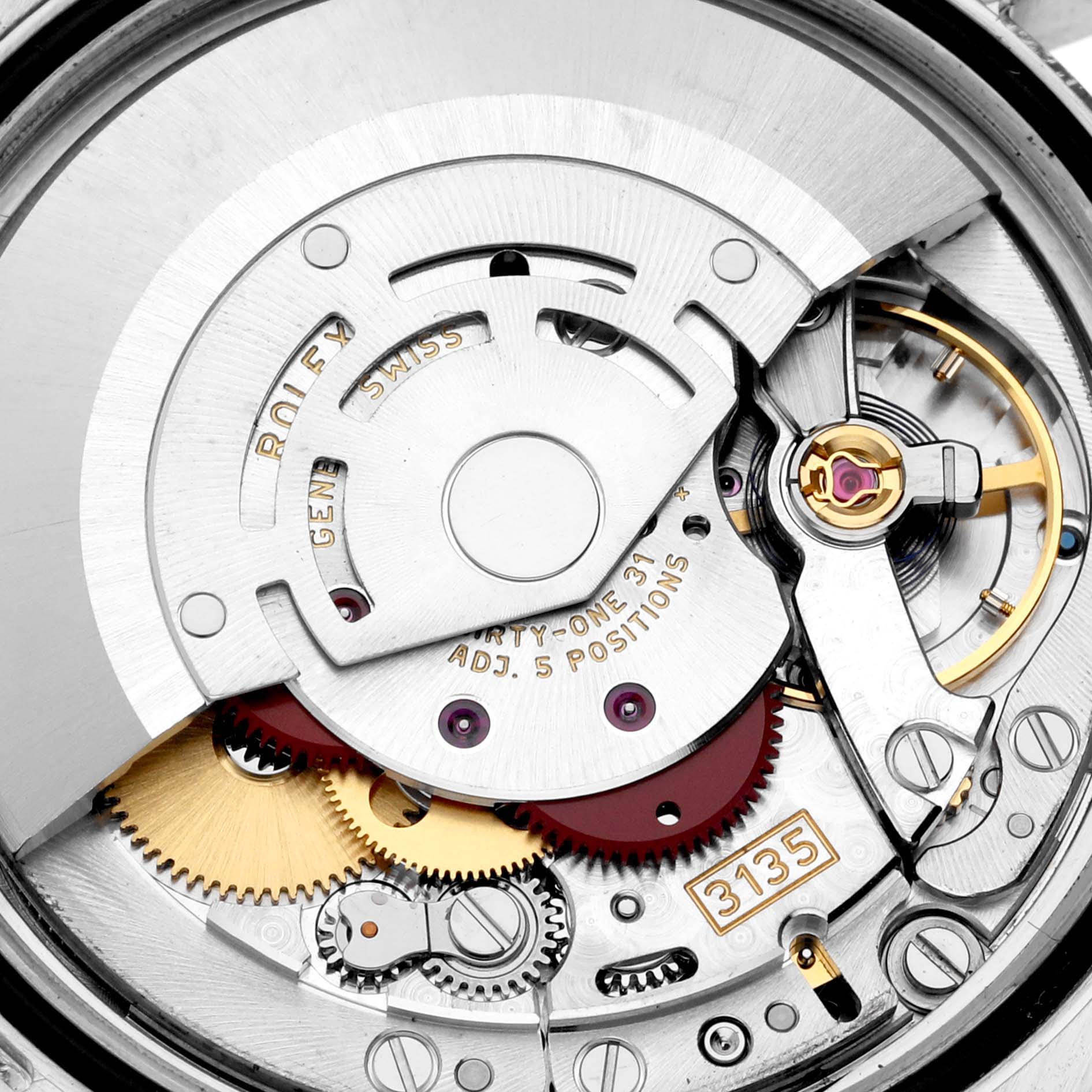This image shows a close-up view of the movement inside a Rolex Datejust 116243 Men
s Steel and Gold (two tone) Silver Dial 116243 Men
s Steel and Gold (two tone) Silver Dial watch, highlighting its intricate gears and components.