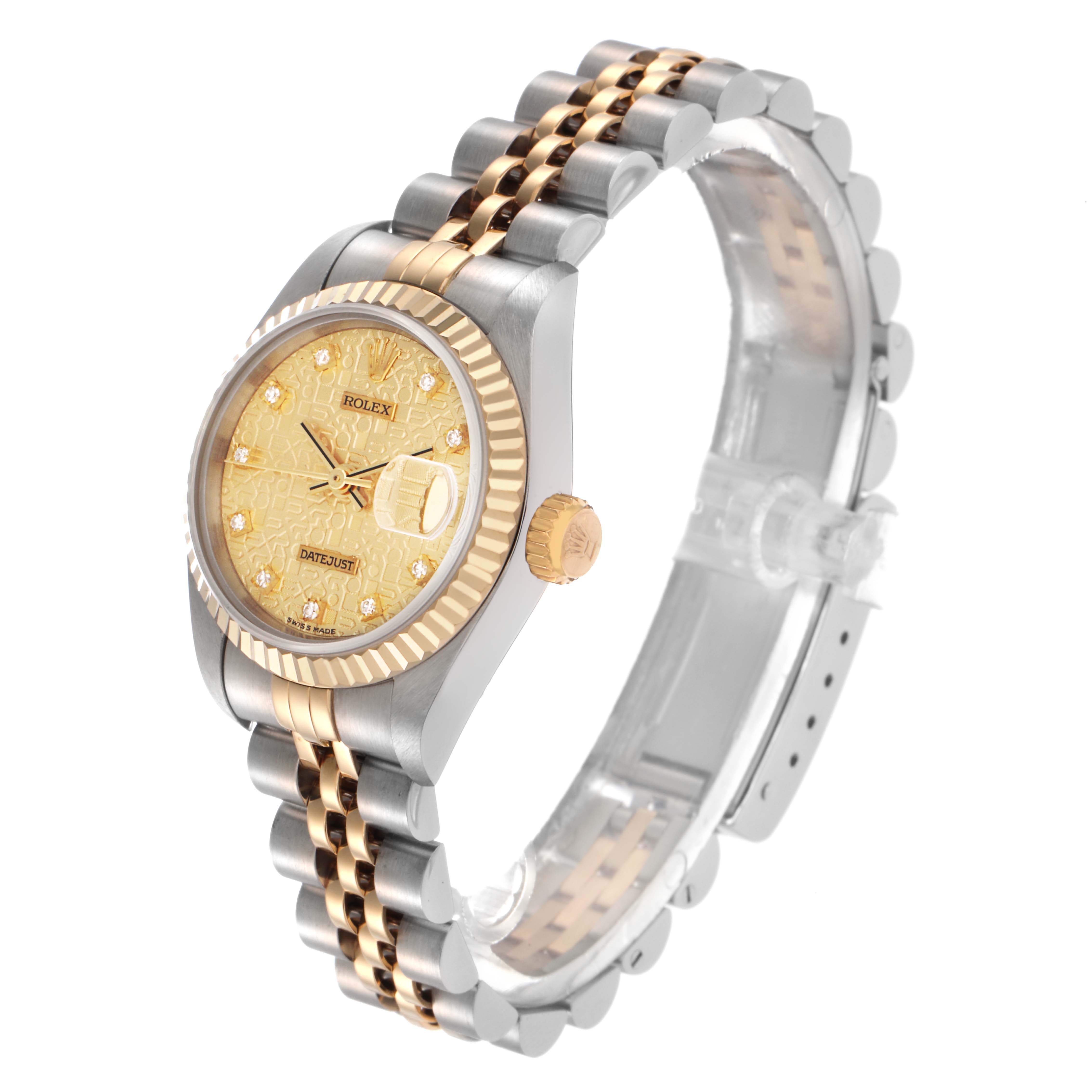 The Rolex Datejust 69173 Women
s Steel and Gold (two tone) Champagne Dial 69173 Women
s Steel and Gold (two tone) Champagne Dial watch is shown at an angled, side view, highlighting its gold and silver bracelet and face.