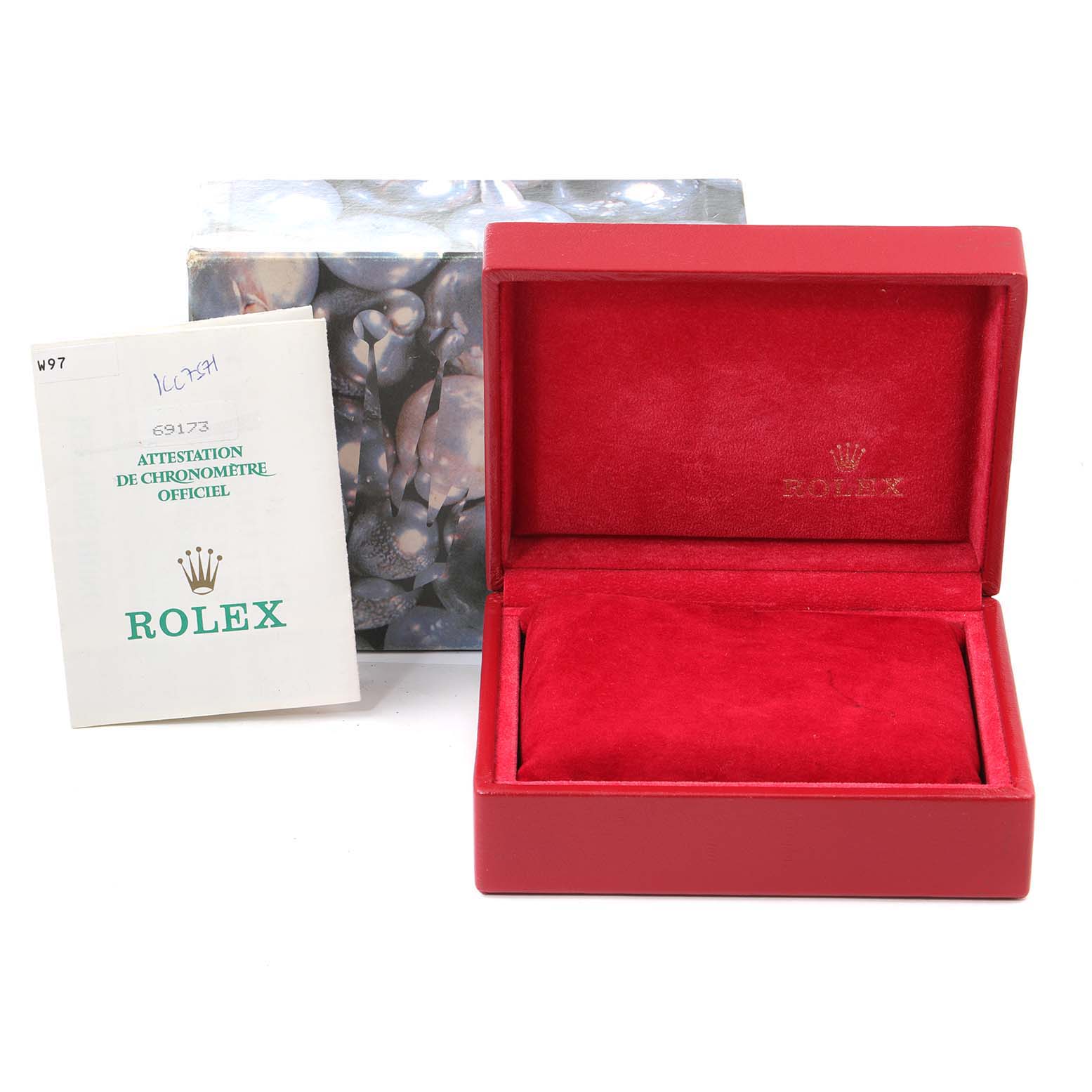 This image shows the packaging and official certification booklet for a Rolex Datejust 69173 Women's Stainless Steel Grey Dial 69173 Women's Stainless Steel Grey Dial model, including a box and red velvet watch cushion.