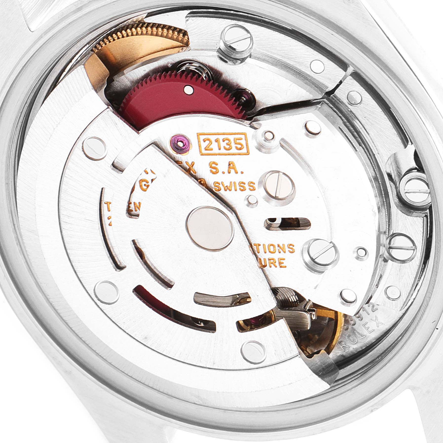 This image shows the internal mechanism of a Rolex Datejust 69173 Women's Steel and Gold (two tone) White Dial 69173 Women's Steel and Gold (two tone) White Dial watch from a close-up, case-back removed angle, highlighting gears and rotors.