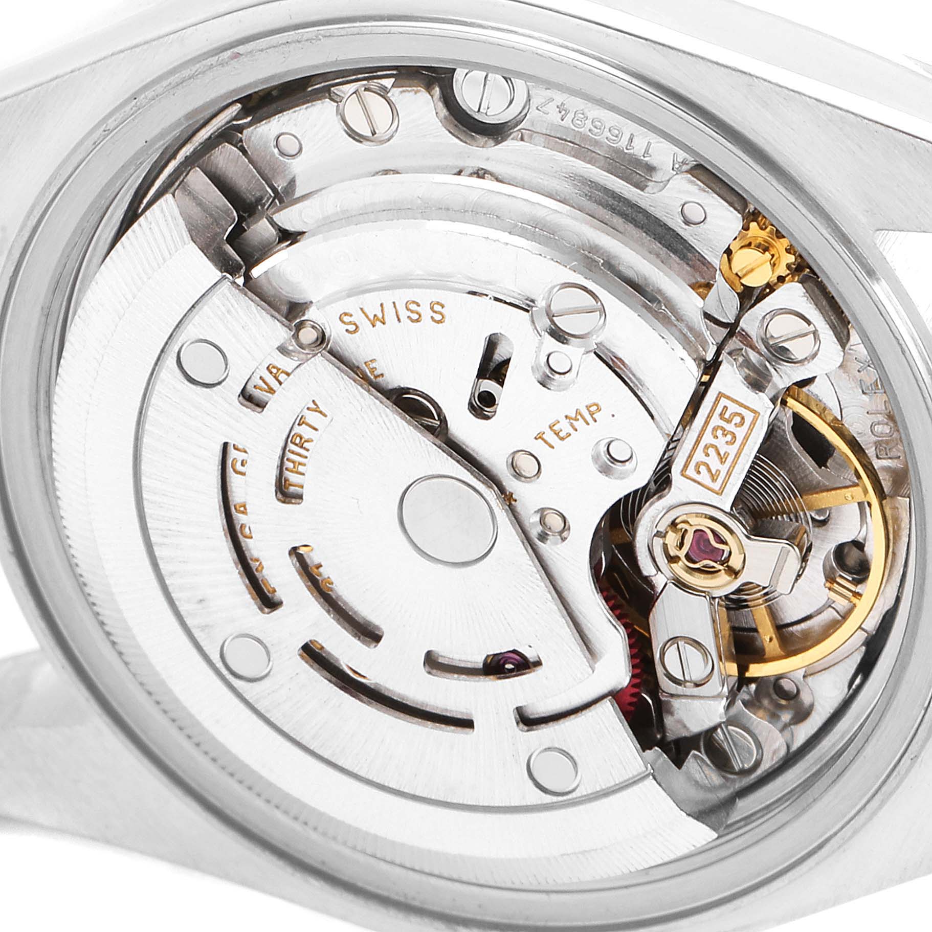 This image shows the internal movement mechanism of a Rolex Datejust 79173 Women
s Steel and Gold (two tone) Champagne Dial 79173 Women
s Steel and Gold (two tone) Champagne Dial watch, specifically the rotor and balance wheel.