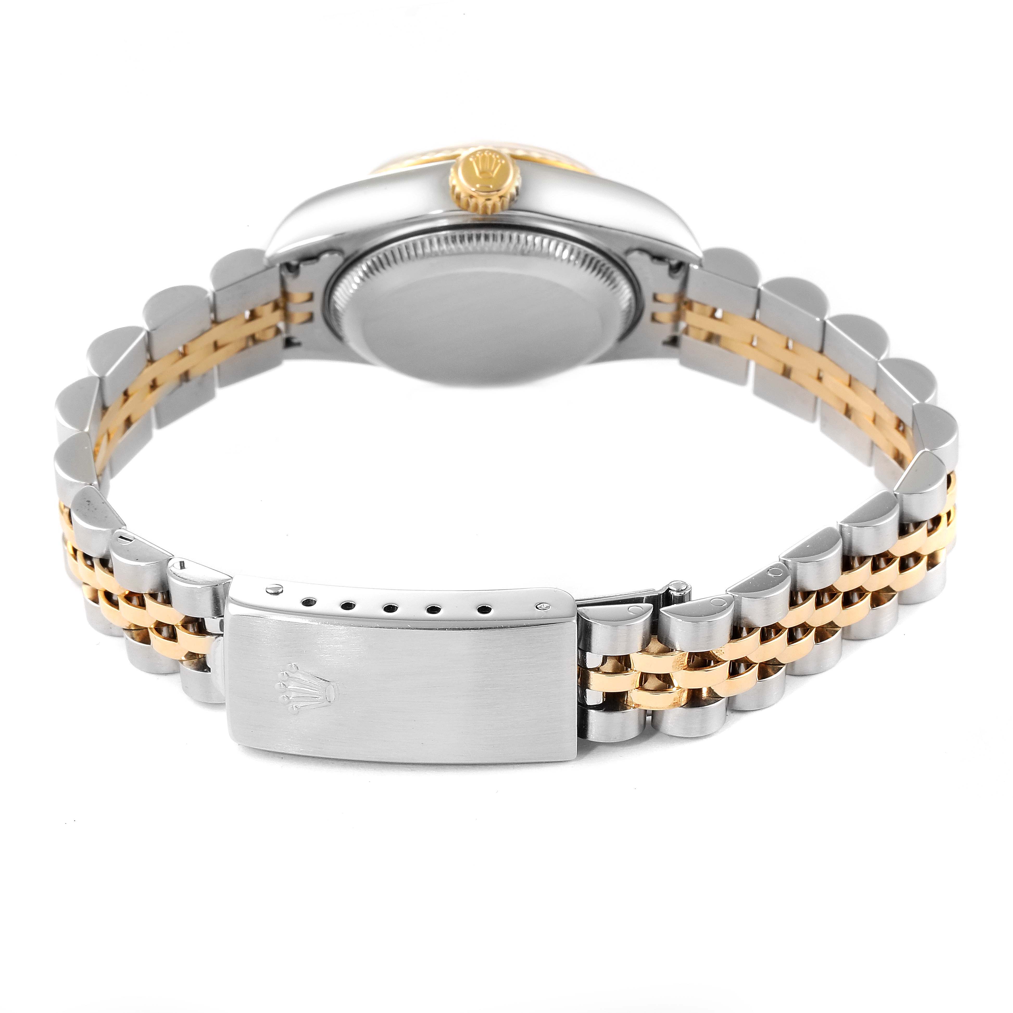 The image shows the back view of a Rolex Datejust 79173 Women
s Steel and Gold (two tone) Champagne Dial 79173 Women
s Steel and Gold (two tone) Champagne Dial watch, focusing on the Jubilee bracelet and clasp.