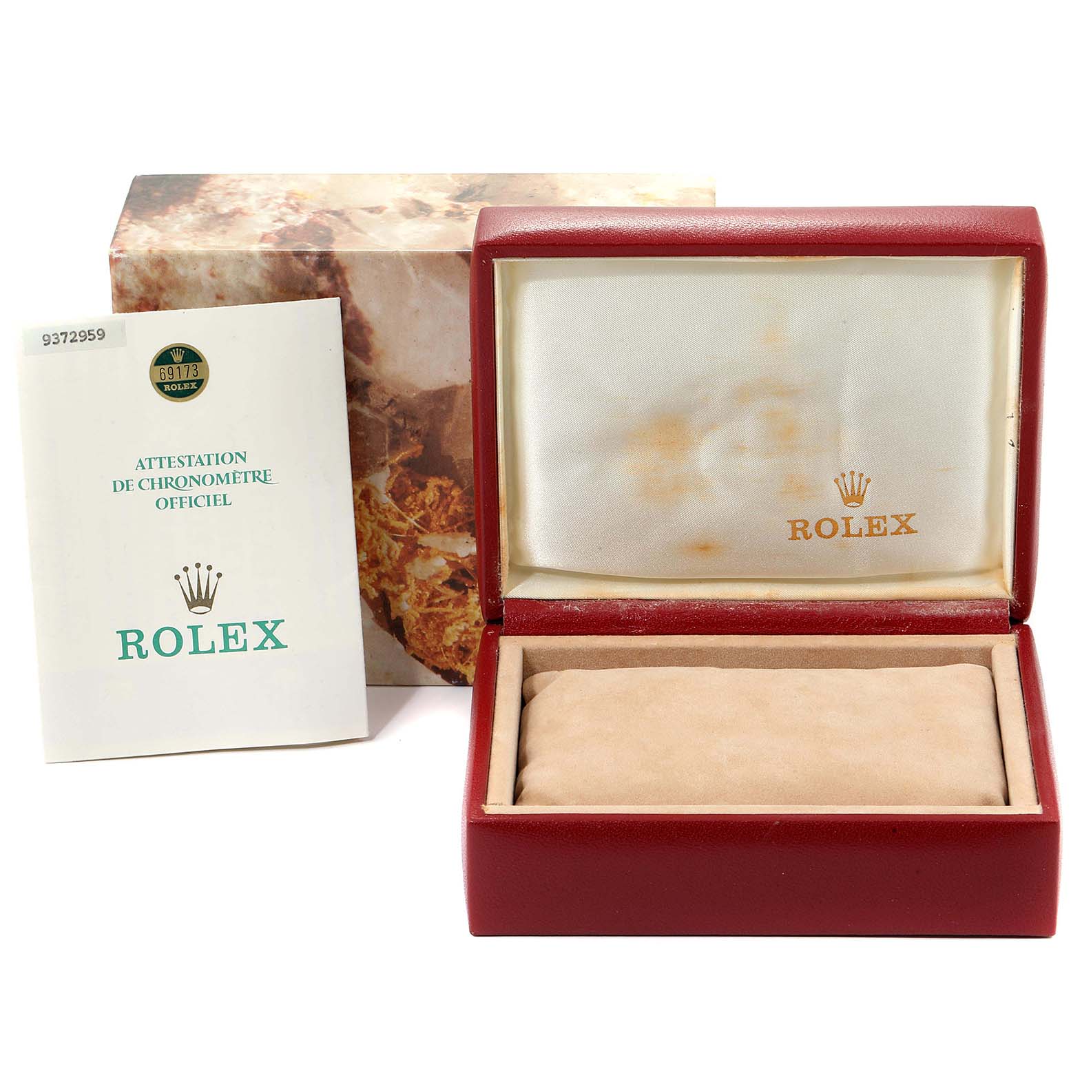 The image shows a Rolex Datejust 69173  Women
s Steel and Gold (two tone) Champagne Dial 69173  Women
s Steel and Gold (two tone) Champagne Dial watch box and official chronometer certification document from a front angle.