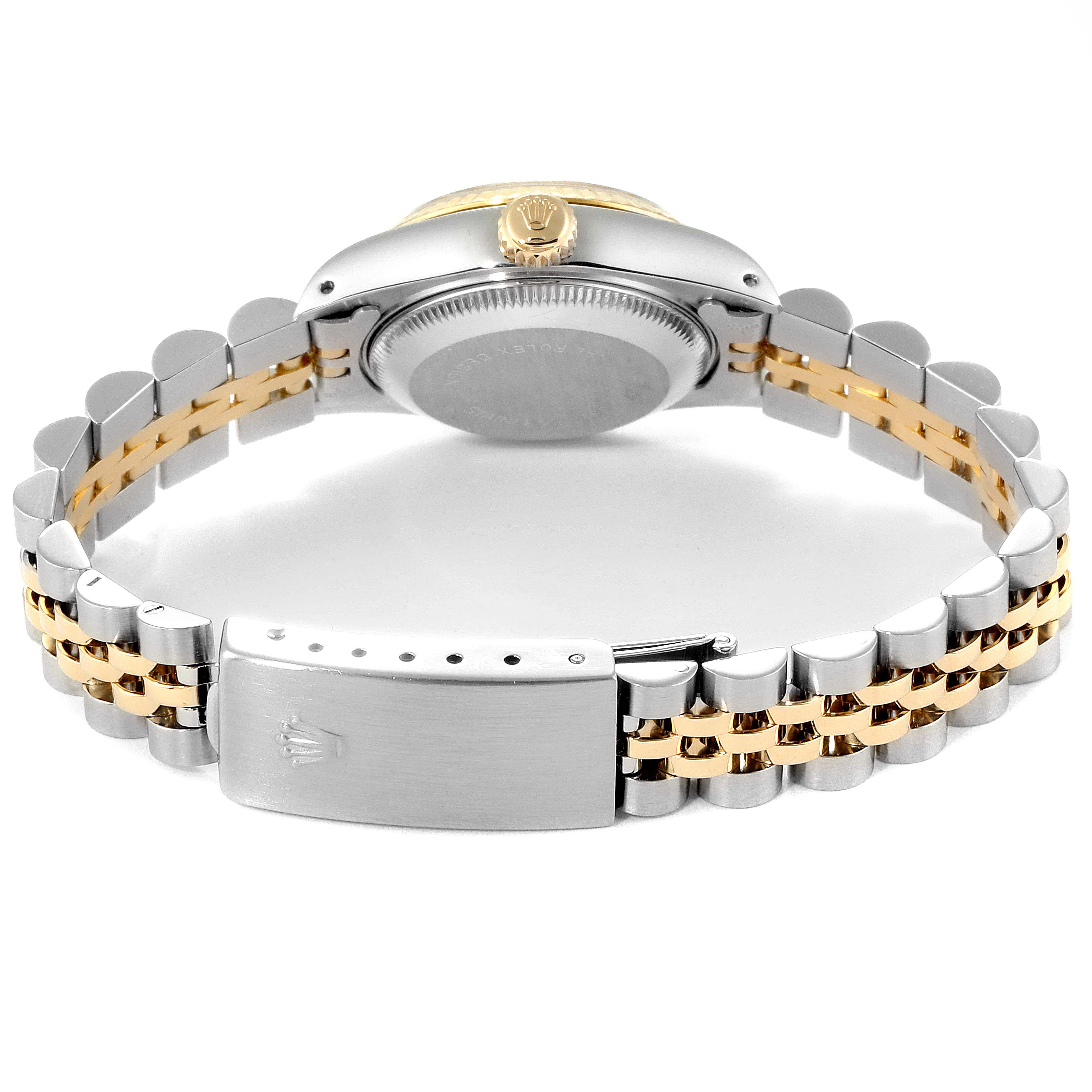 This image shows the back view of the Rolex Datejust 69173  Women
s Steel and Gold (two tone) Champagne Dial 69173  Women
s Steel and Gold (two tone) Champagne Dial watch, highlighting the clasp, bracelet, and case back.