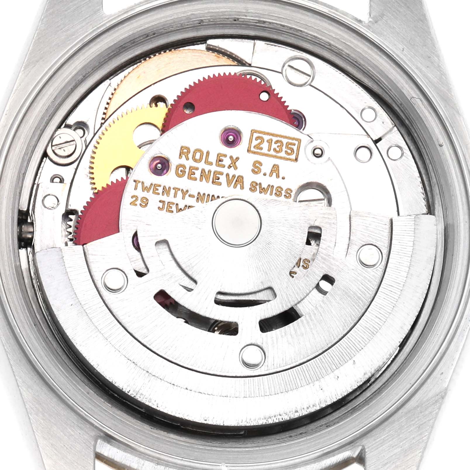 The image shows the back view of a Rolex Datejust 69173 Women
s Steel and Gold (two tone) Champagne Dial 69173 Women
s Steel and Gold (two tone) Champagne Dial, focusing on its movement and internal mechanisms.