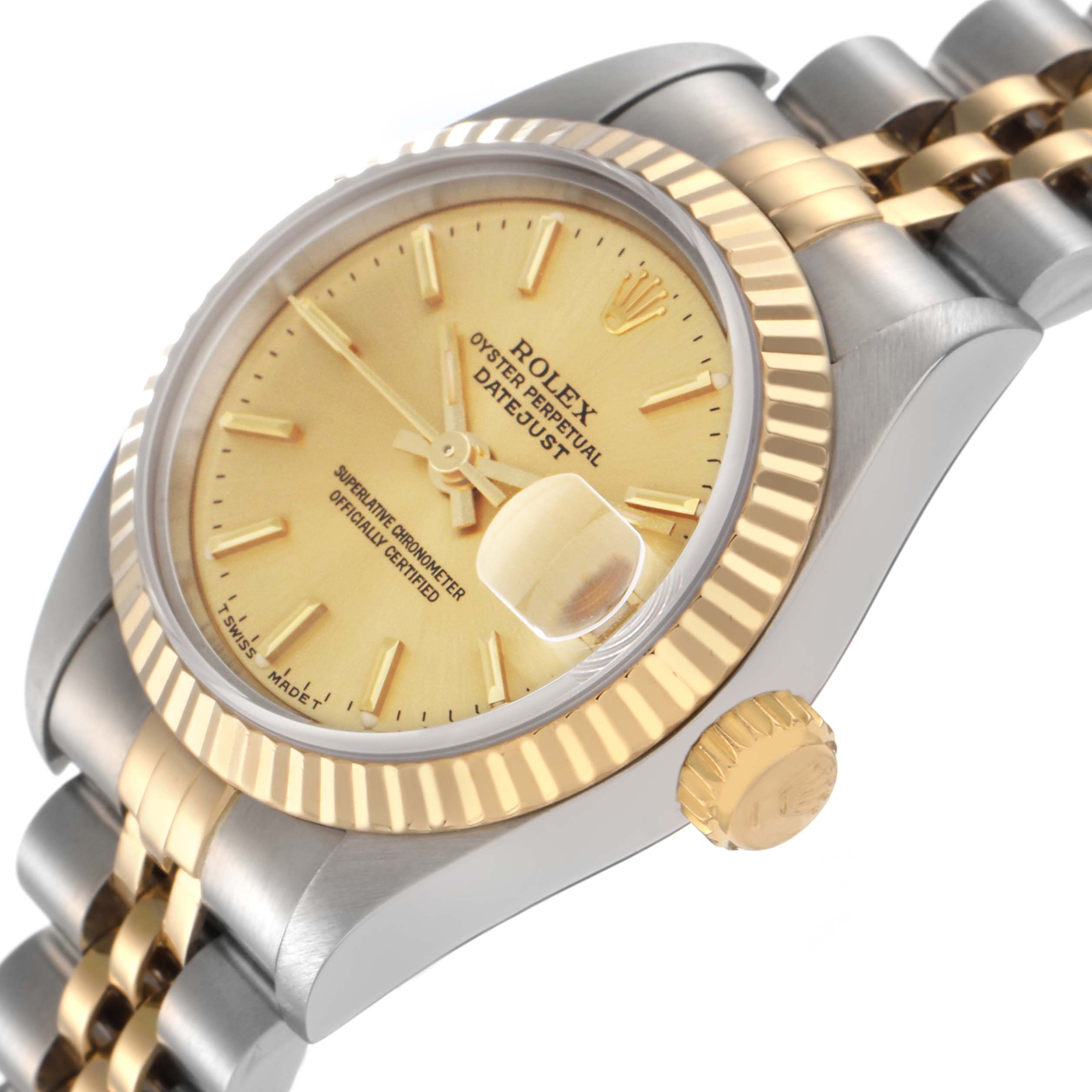 The Rolex Datejust 69173 Women
s Steel and Gold (two tone) Champagne Dial 69173 Women
s Steel and Gold (two tone) Champagne Dial watch is shown from a side angle, highlighting the gold and silver-tone jubilee bracelet, fluted bezel, crown, and champagne dial.