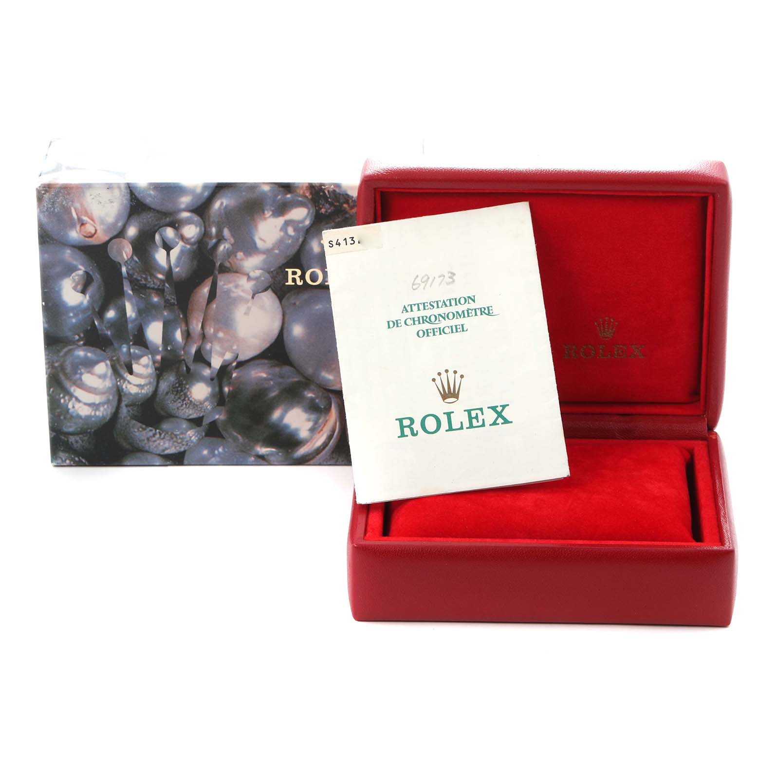 The image shows the packaging and certificate for a Rolex Datejust 69173 Women
s Steel and Gold (two tone) Champagne Dial 69173 Women
s Steel and Gold (two tone) Champagne Dial watch, including the box and paperwork.