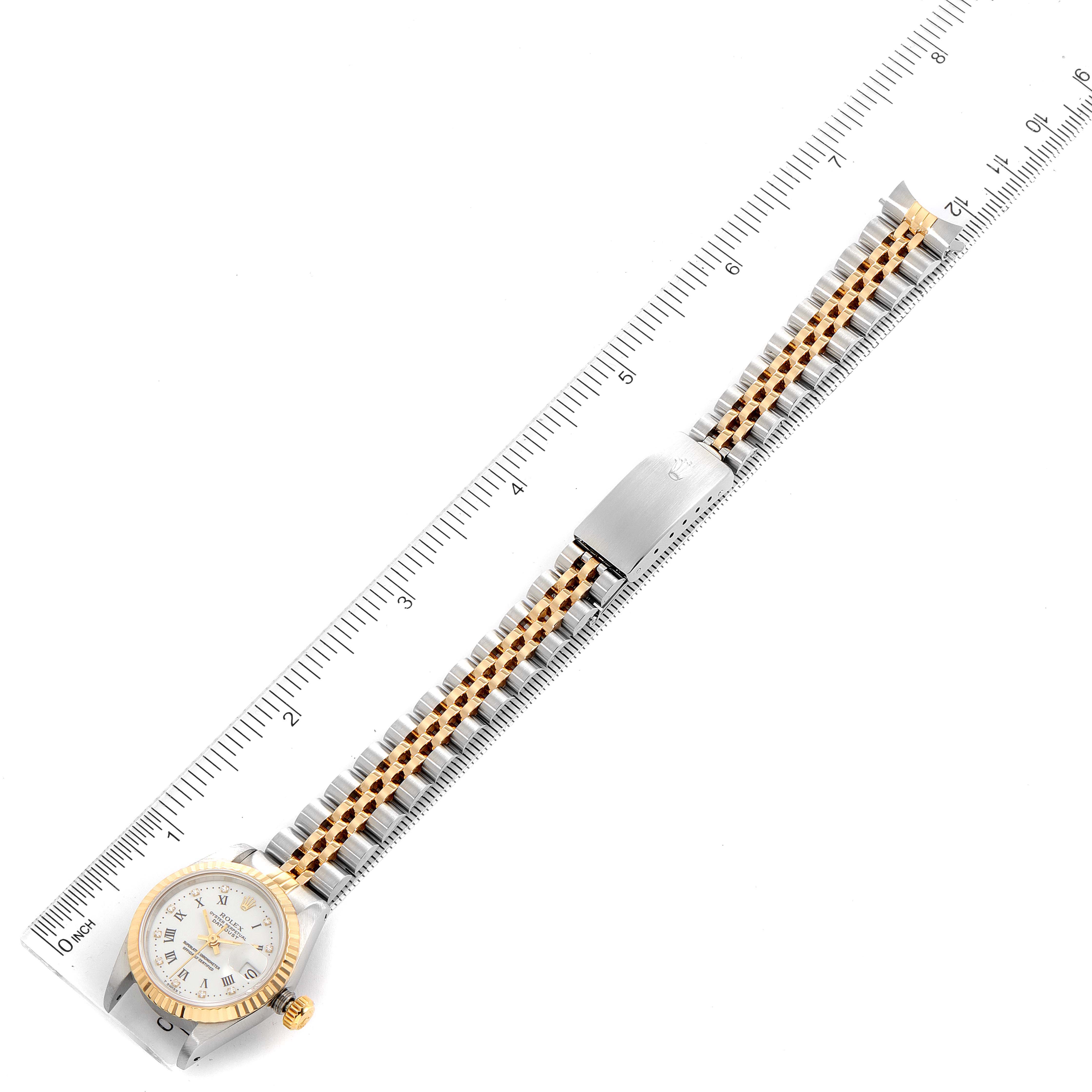 The Rolex Datejust 69173 Women's Steel and Gold (two tone) White Dial 69173 Women's Steel and Gold (two tone) White Dial watch is shown from the top view, featuring the full length of the bracelet and clasp.