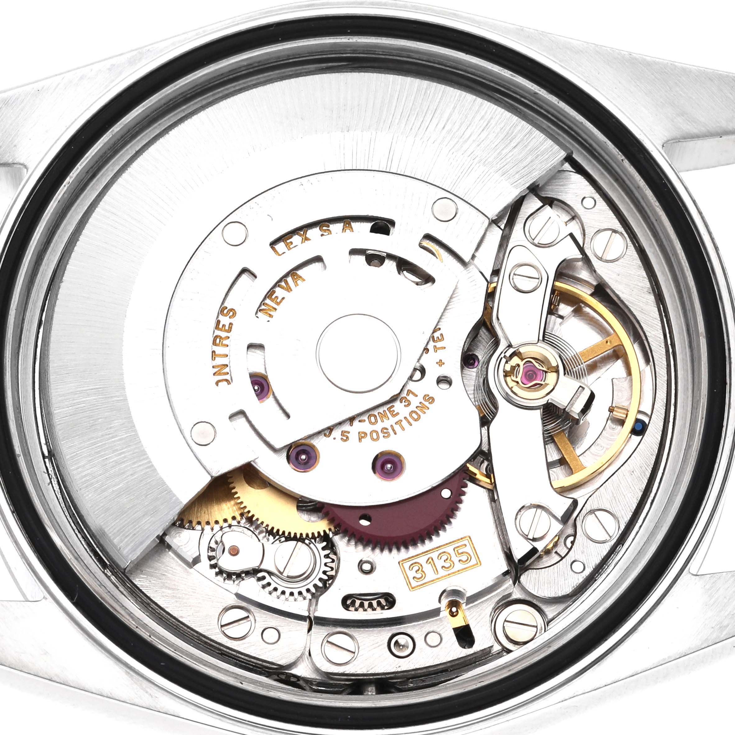 The image shows the intricate internal mechanism of a Rolex Datejust 16200 Men's Stainless Steel White Dial 16200 Men's Stainless Steel White Dial watch, focusing on its movement components.