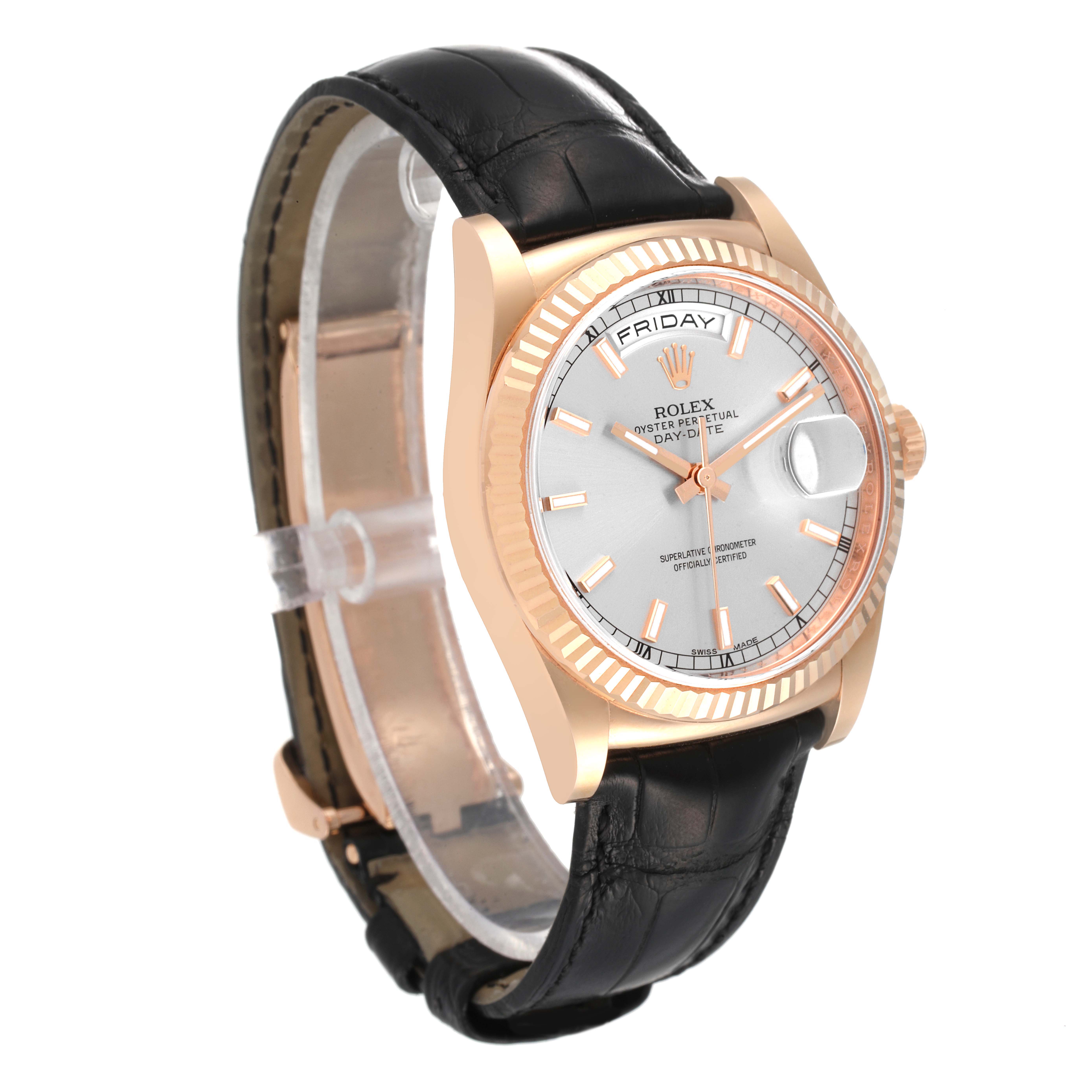 The Rolex President 118135 Men's Rose Gold Silver Dial 118135 Men's Rose Gold Silver Dial watch model is shown at an angled view, displaying its face, bezel, and black leather strap.