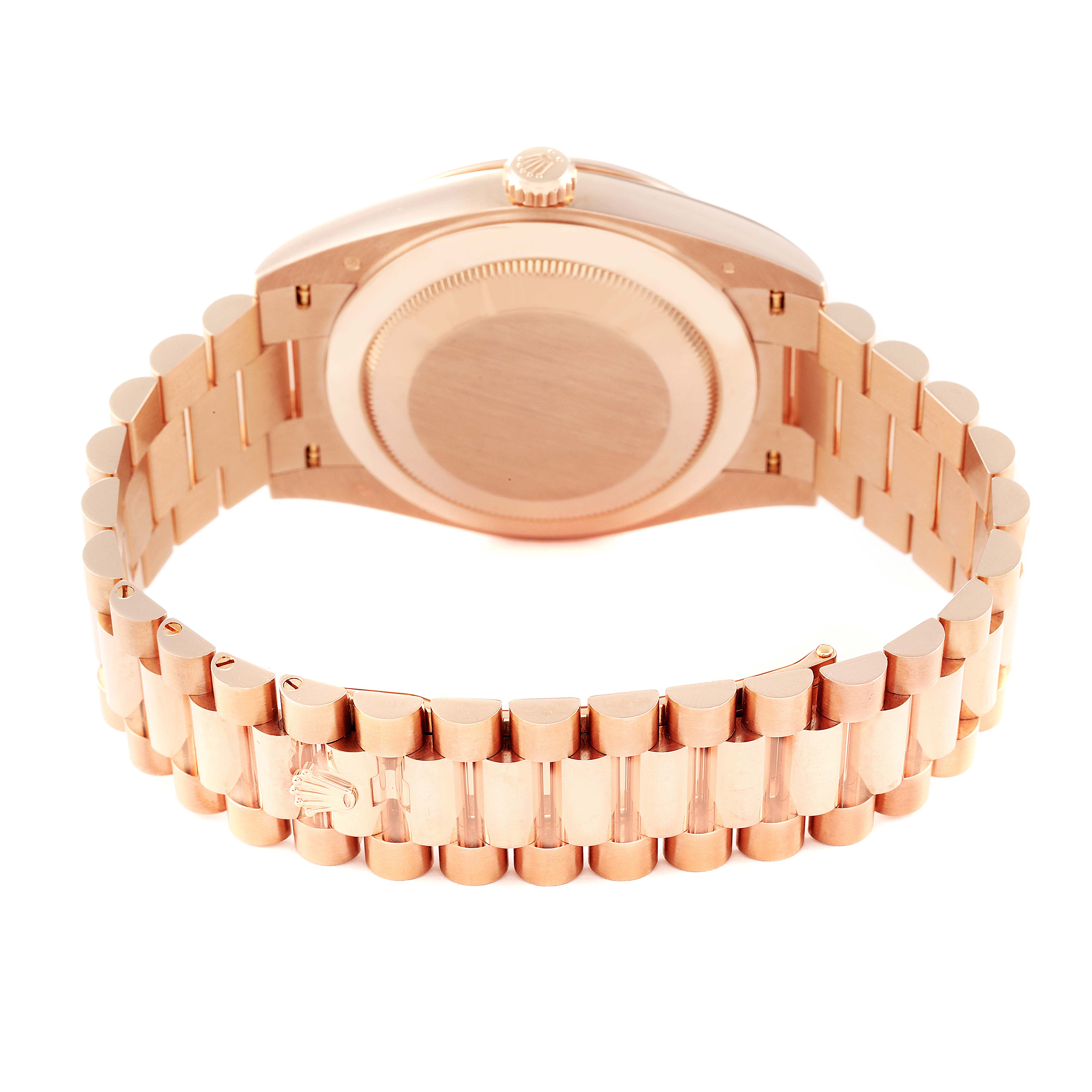 This image shows the back and bracelet of a Rolex President 228345RBR Men's Rose Gold Pink Dial 228345RBR Men's Rose Gold Pink Dial model watch in rose gold.