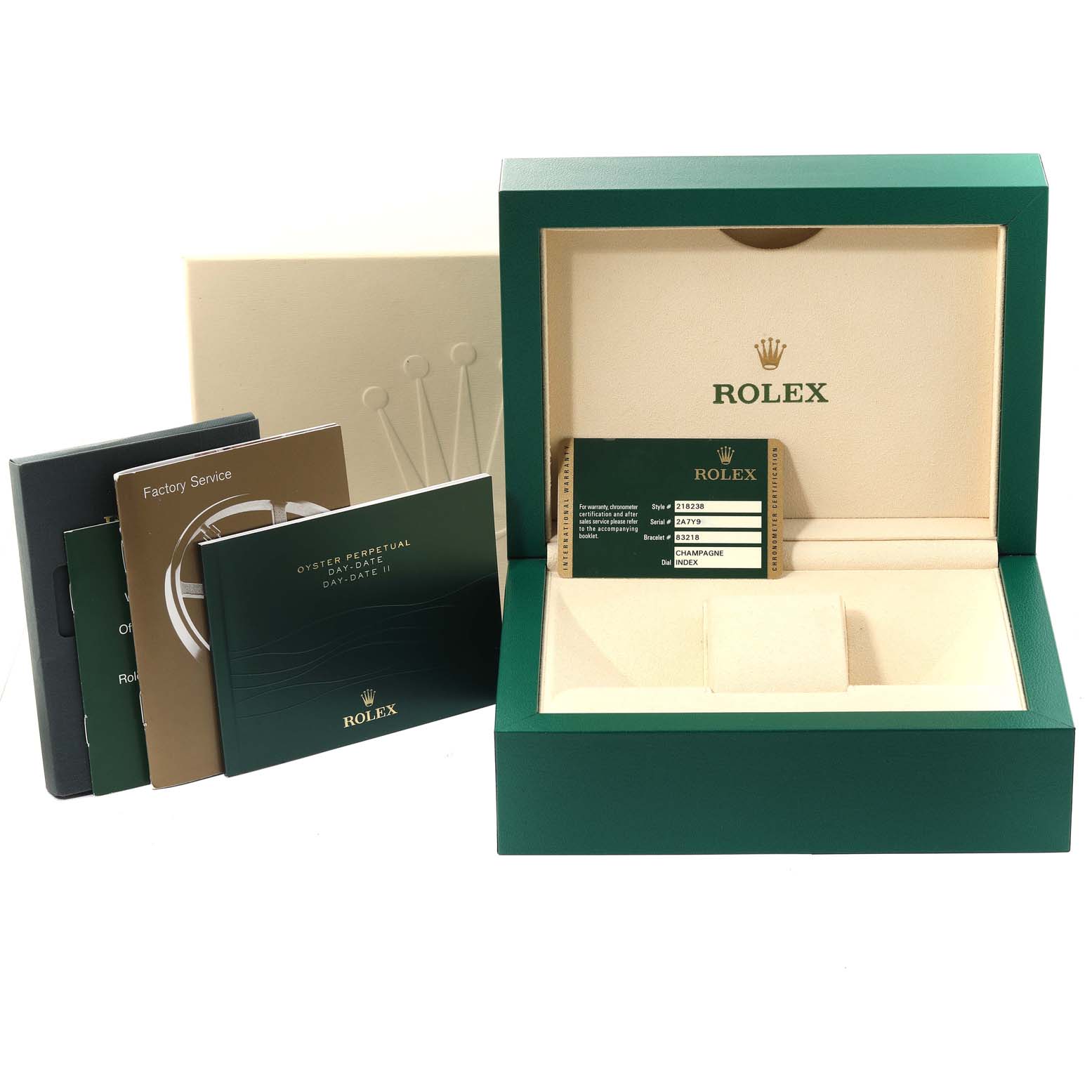 This image shows the packaging, warranty card, and booklets for a Rolex President 218238 Men's Yellow Gold Champagne Dial 218238 Men's Yellow Gold Champagne Dial model watch.