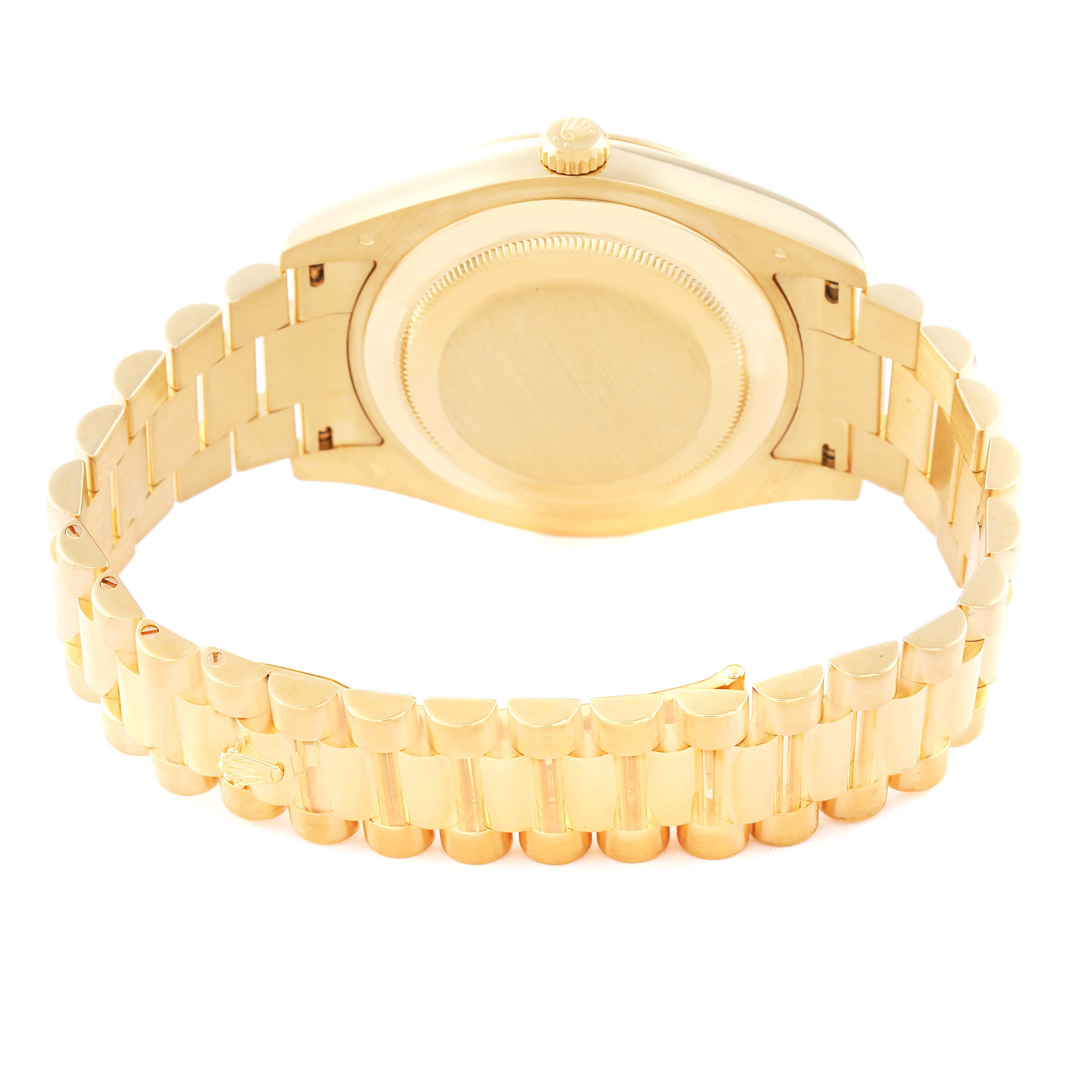 This image shows the backside and the bracelet of a Rolex President 218238 Men's Yellow Gold Champagne Dial 218238 Men's Yellow Gold Champagne Dial model watch, displaying the clasp and case back.