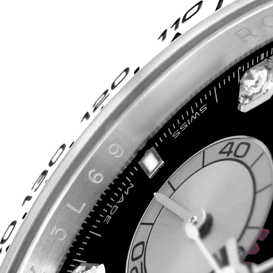 The image shows a close-up of the Rolex Daytona 126509 Men's White Gold Black Dial watch face, highlighting the dial, bezel, and markers.