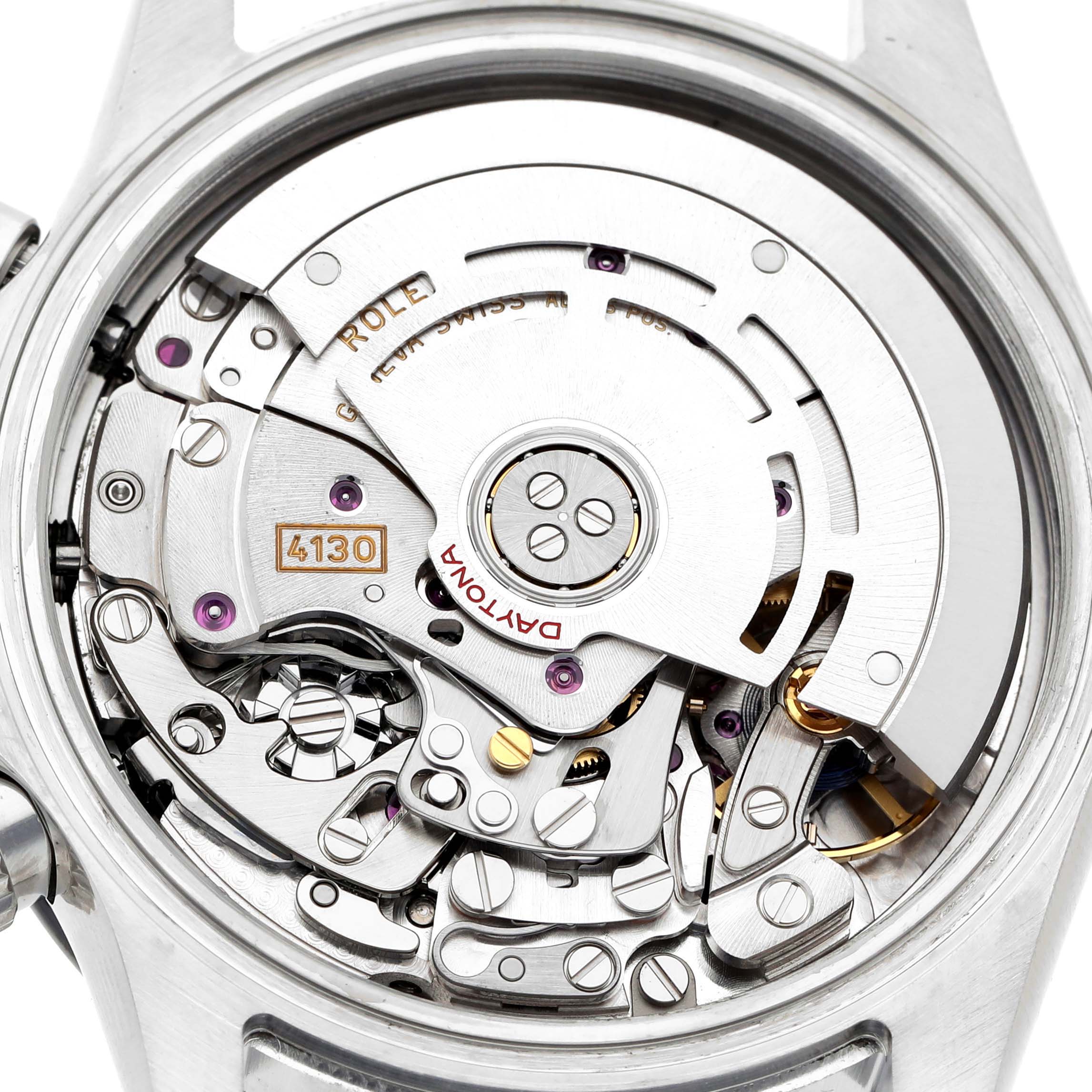 The image shows the movement of a Rolex Daytona 116500LN Men's Stainless Steel White Dial, highlighting its intricate mechanical components and rotor from a top view.