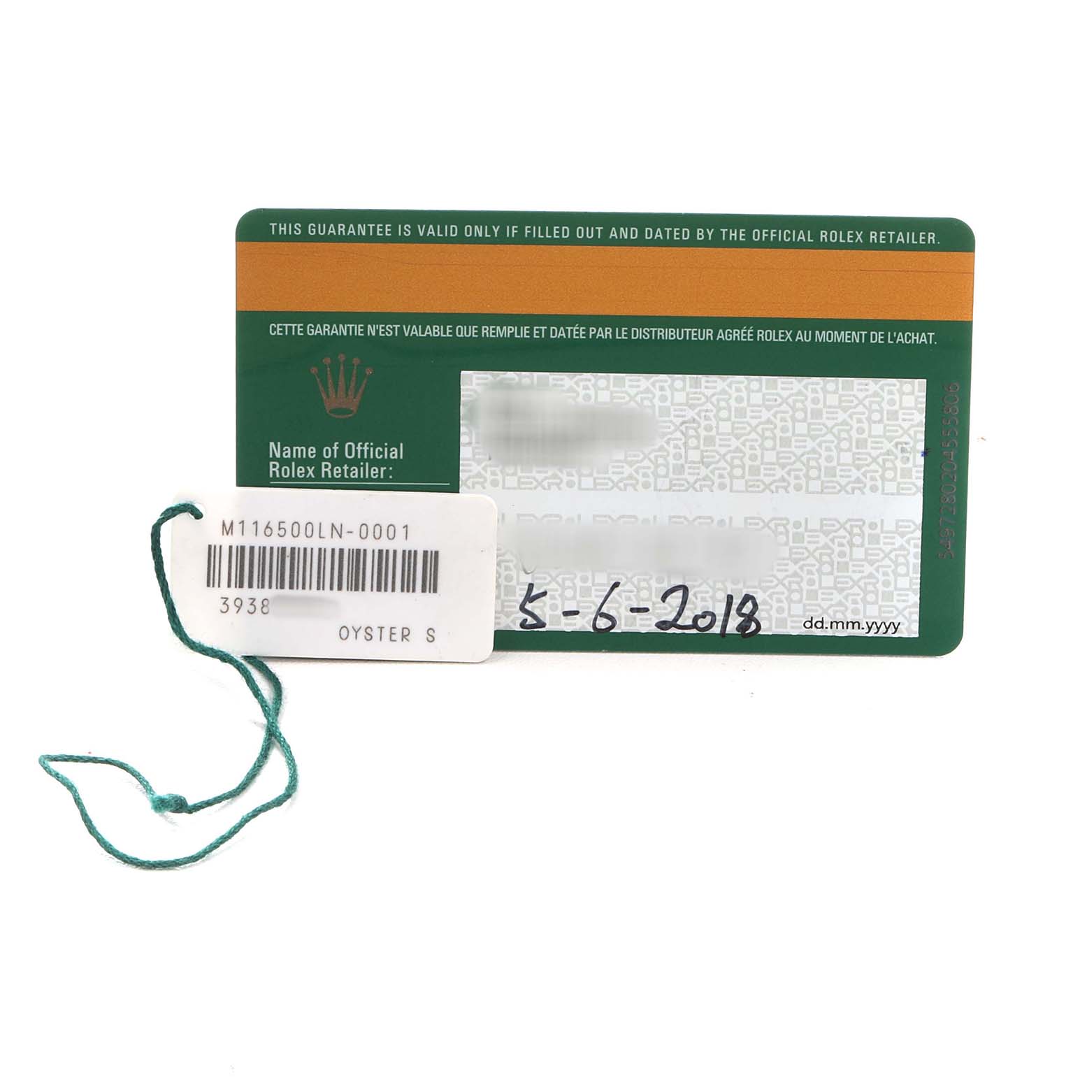 The image shows a green and orange warranty card from Rolex for the Daytona model, including a tag with model information.
