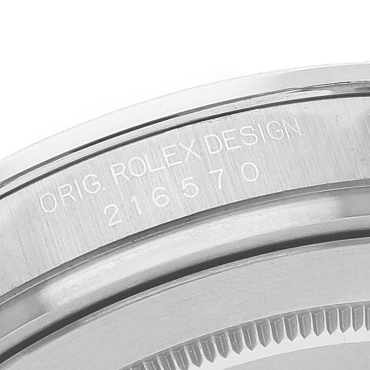 This close-up of the Rolex Explorer 216570 Men's Stainless Steel White Dial 216570 Men's Stainless Steel White Dial watch shows the engraving on the case with model number 216570.