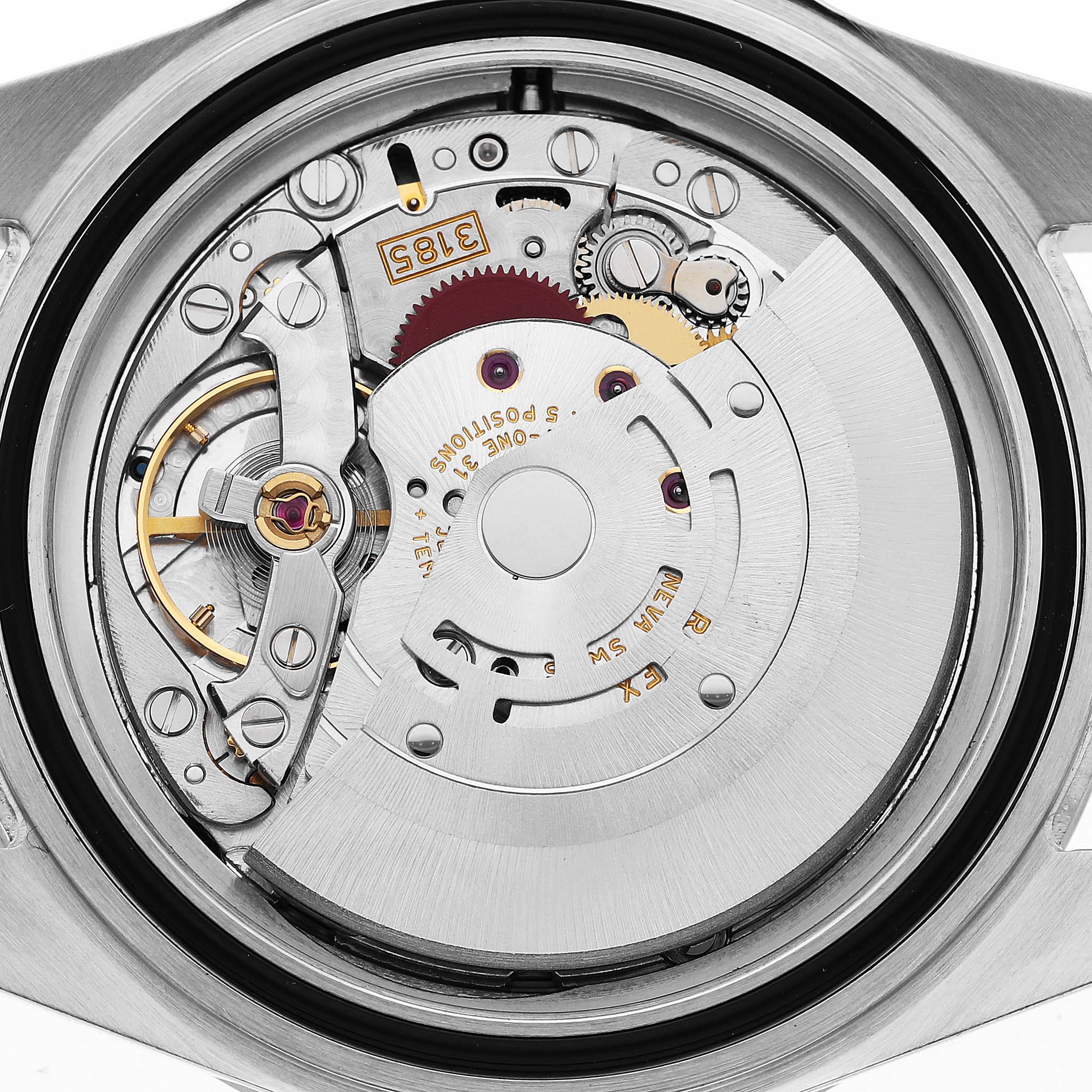 The image shows the movement of the Rolex Explorer 16570 T Men's Stainless Steel Black Dial, viewed from the back, highlighting gears and mechanical components.